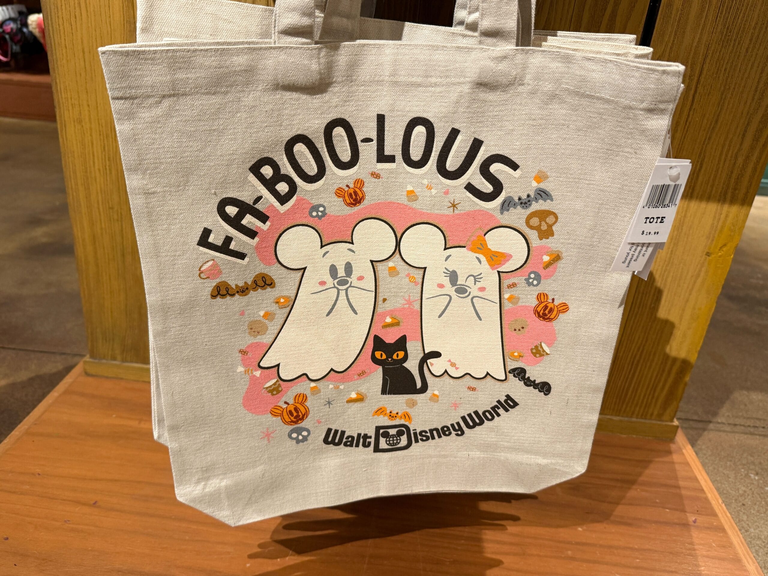 A Disney Halloween Merch tote for 2025, with ghostly Mickey faces, a black cat, and “FA-BOO-LOUS Walt Disney World.”