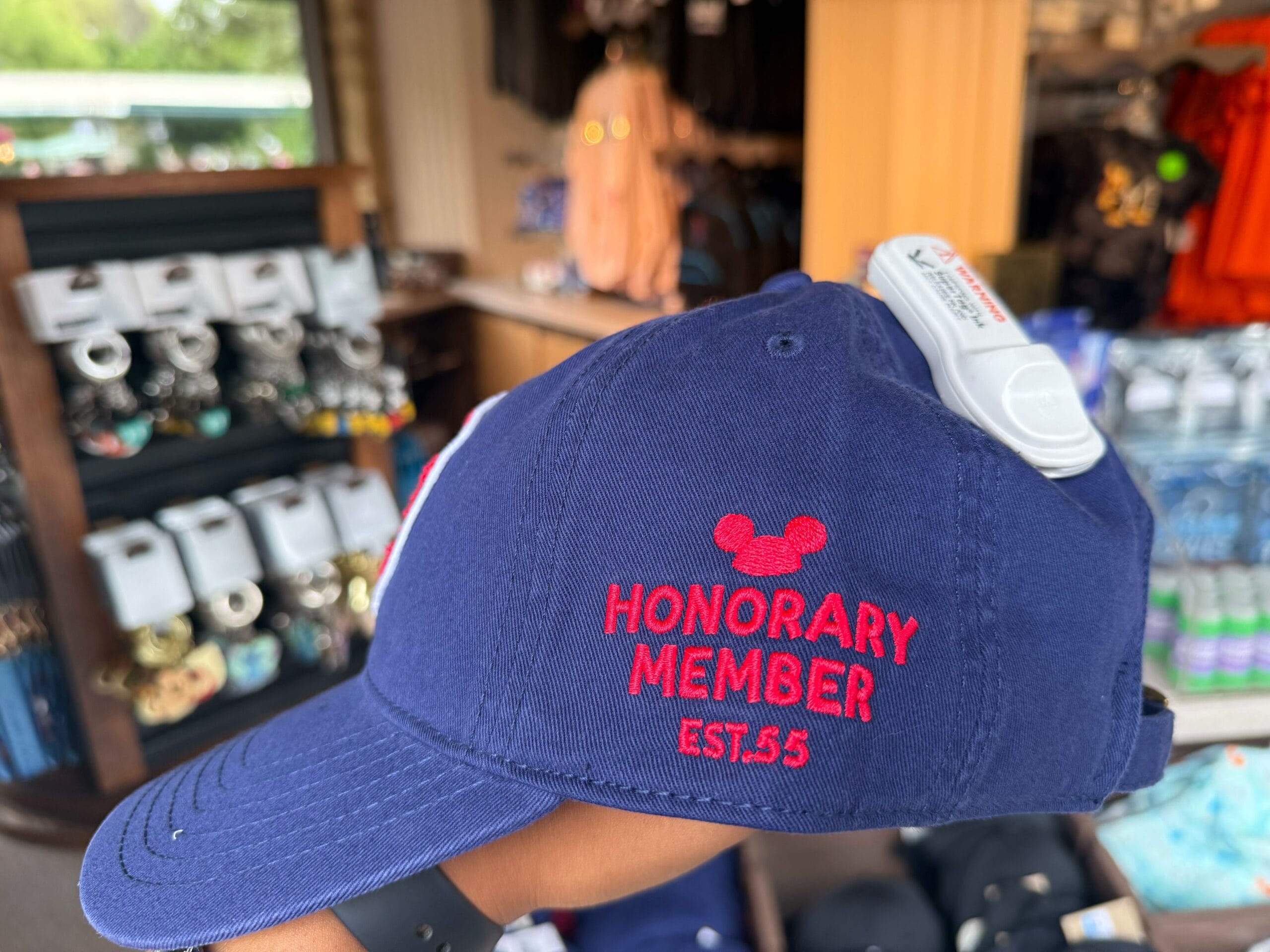 Blue cap with red text "Honorary Member EST. 55" and Mickey Mouse, perfect for Disneyland or Mickey Mouse Club merchandise fans.