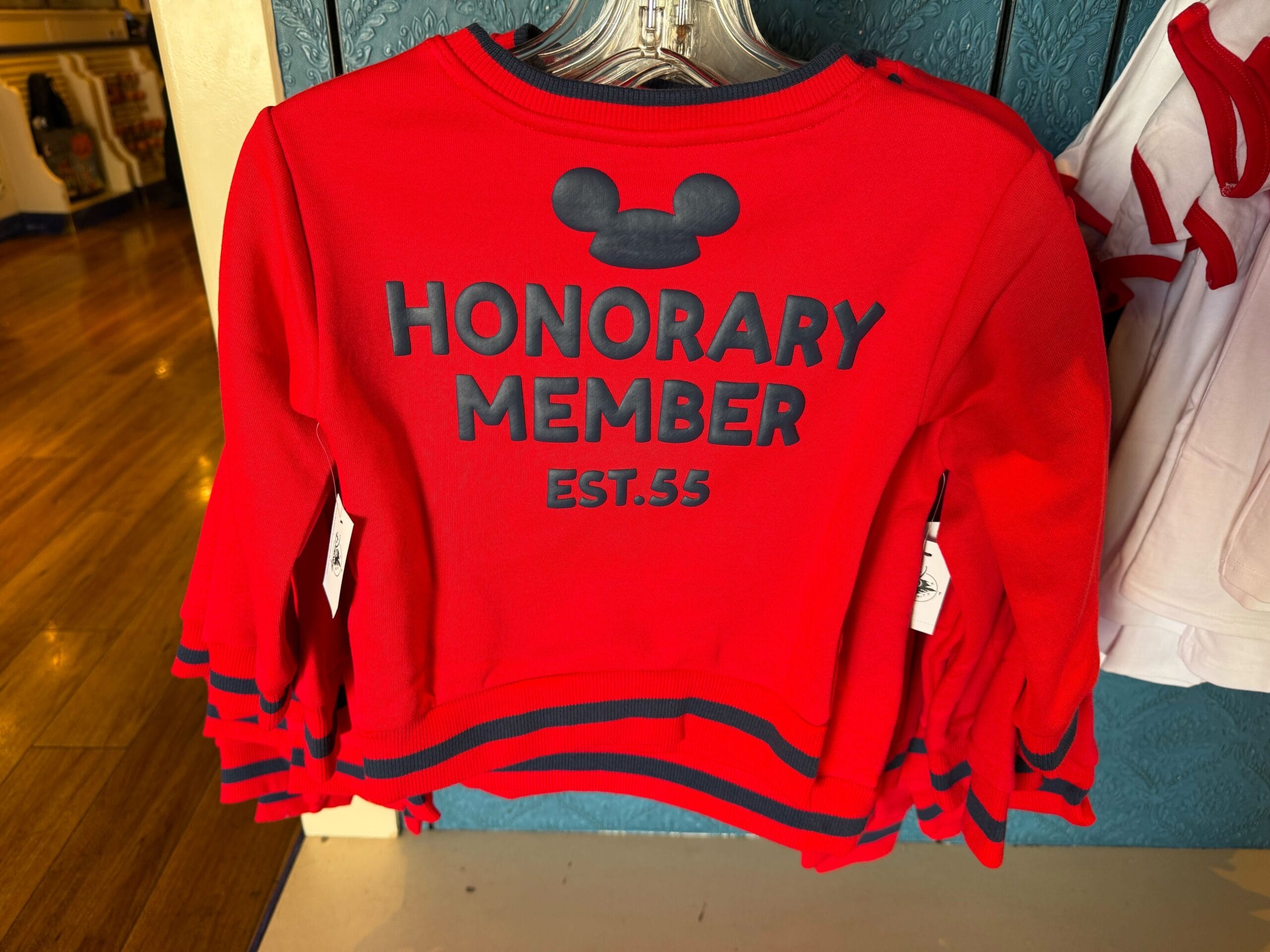 Red sweatshirt with black text and Mickey Mouse icon—perfect for Disneyland or as Mickey Mouse Club merchandise.