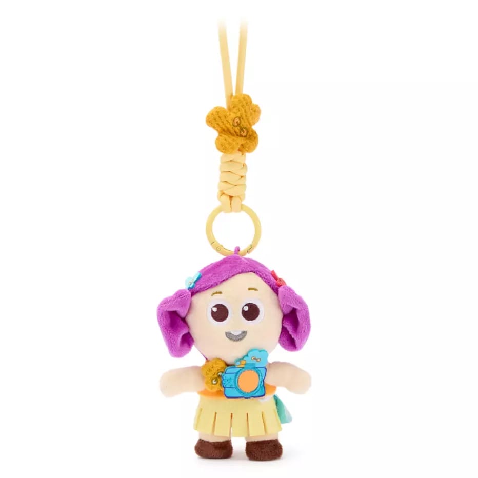 Plush keychain of a smiling character with purple hair, inspired by Disney Store China Toy Story Bag Charms.