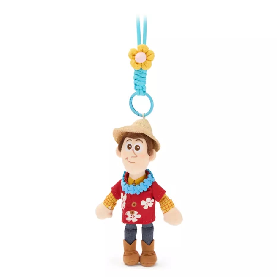 Plush keychain of a cartoon cowboy in a red Hawaiian shirt—Toy Story bag charms available in U.S. and Disney Store China.