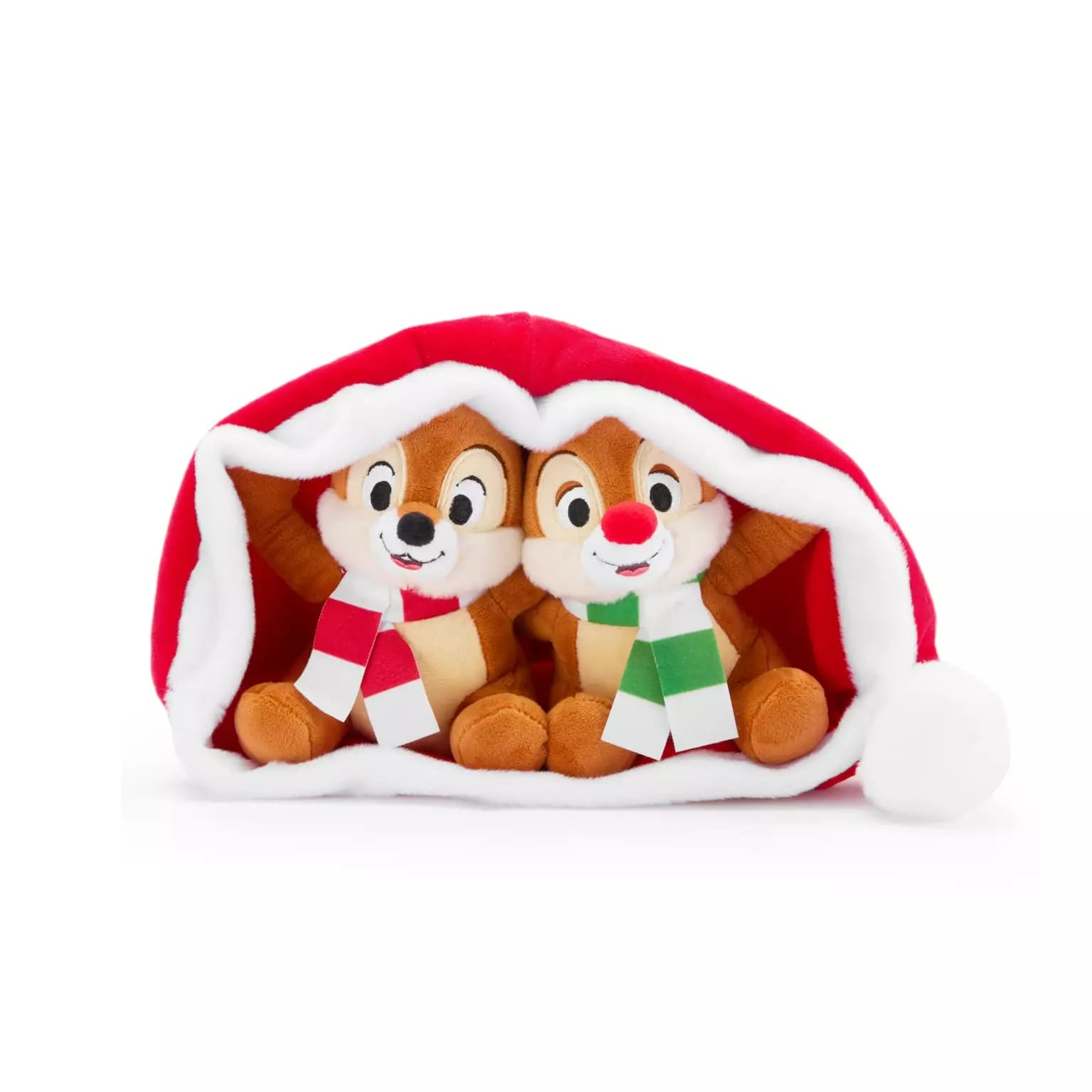 Two chipmunk plush toys in scarves sit inside a Disney Store Santa hat, part of Disney Christmas merchandise 2025.