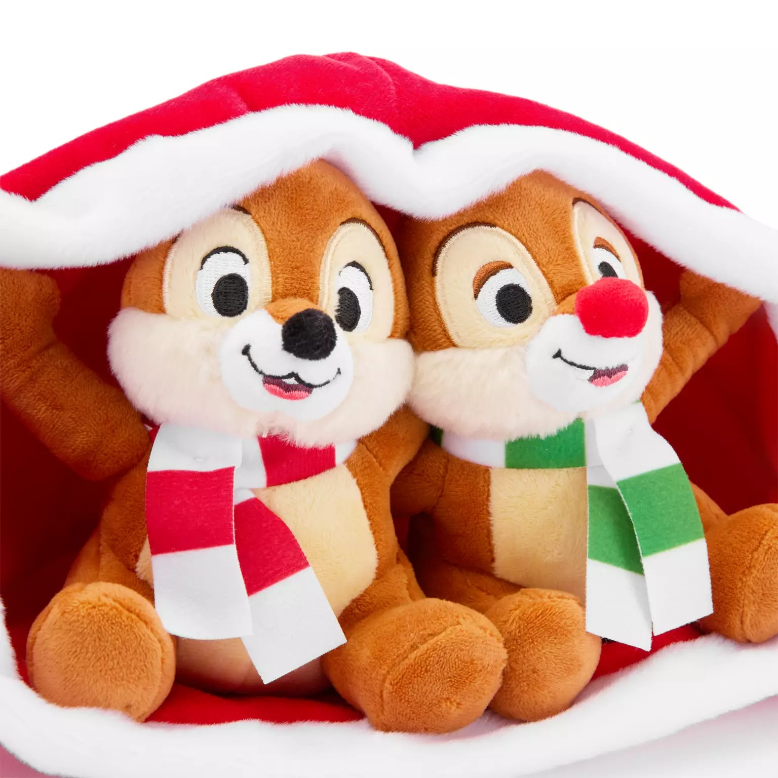 Two plush chipmunks in scarves smile under a Santa hat—a charming 2025 Disney Store Christmas merchandise find.