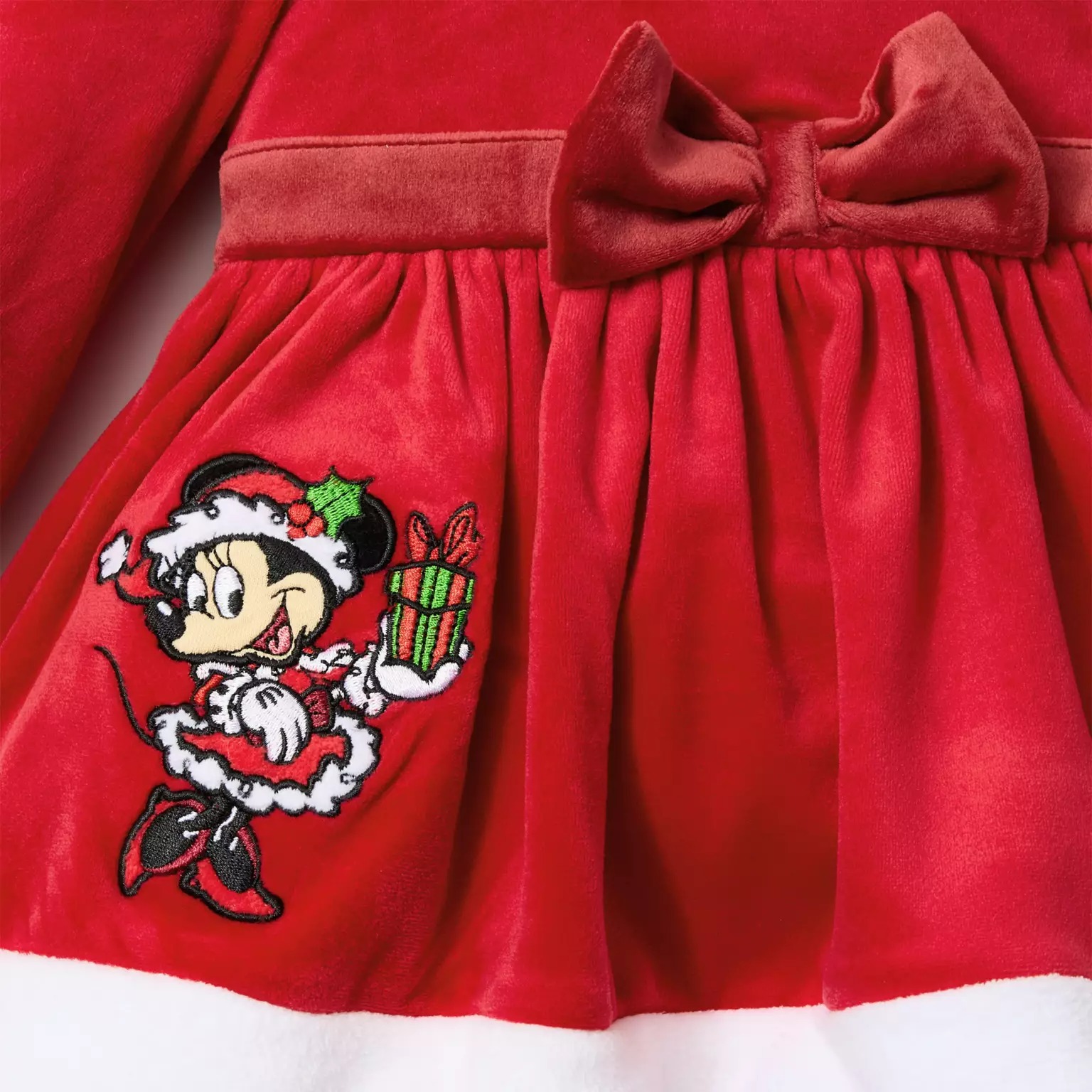 Red velvet dress with a bow and embroidered Minnie Mouse in a Santa outfit—perfect Disney Christmas merchandise for 2025.
