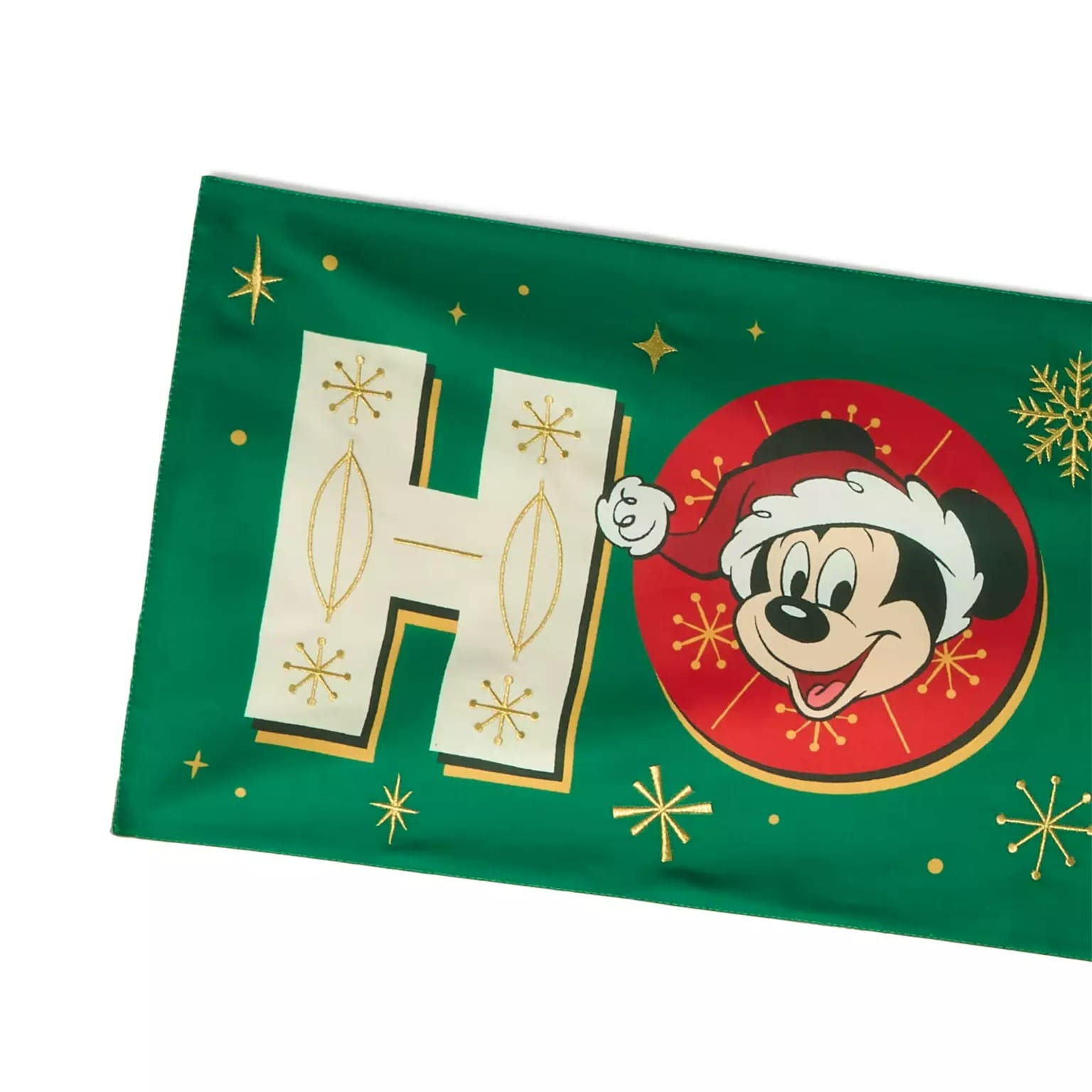 Green fabric with "HO" in gold and white, beside Mickey Mouse in a Santa hat—perfect Disney Christmas merchandise for 2025.