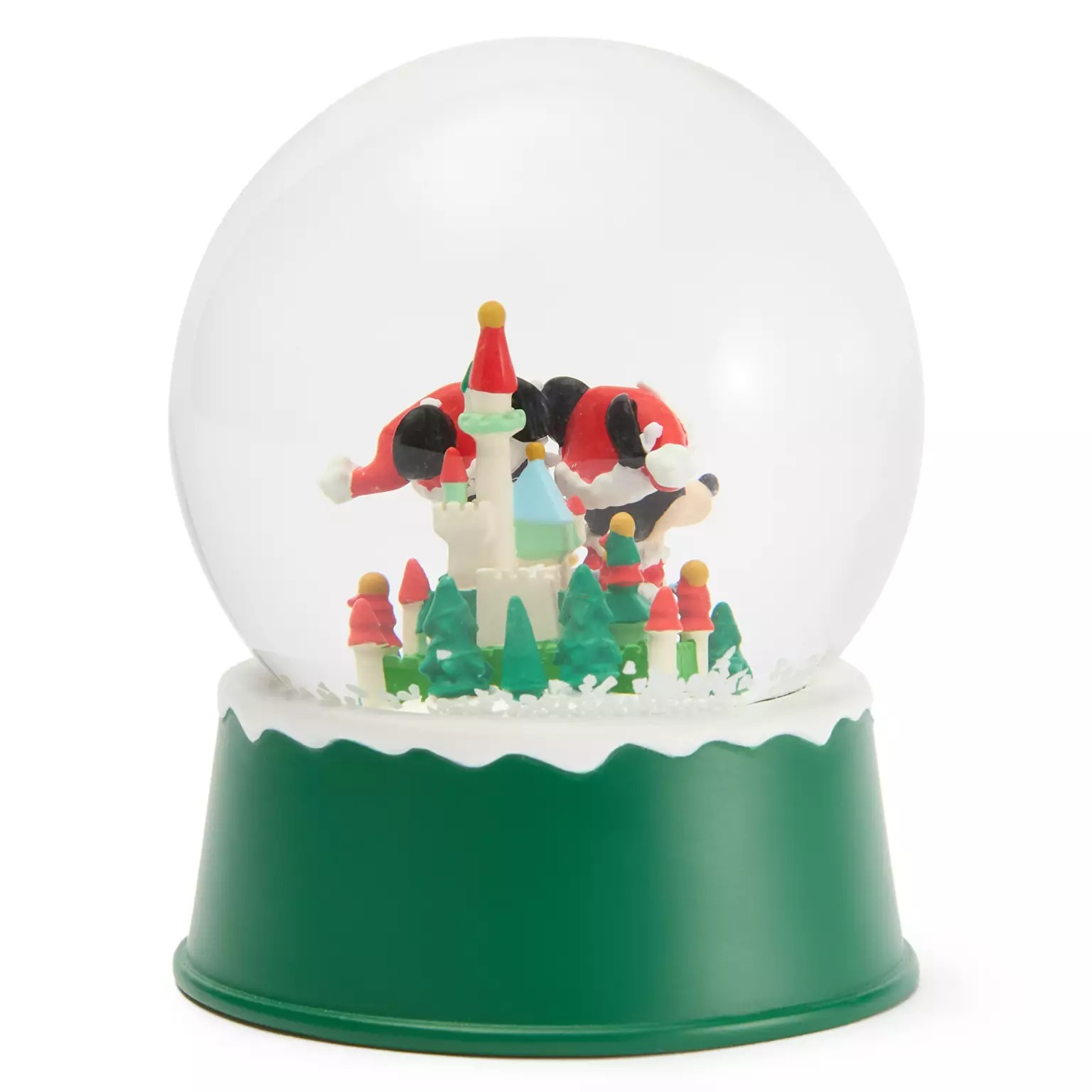 Festive dog in a Santa hat by a castle, surrounded by snow—Disney Store Christmas merchandise on a green base.