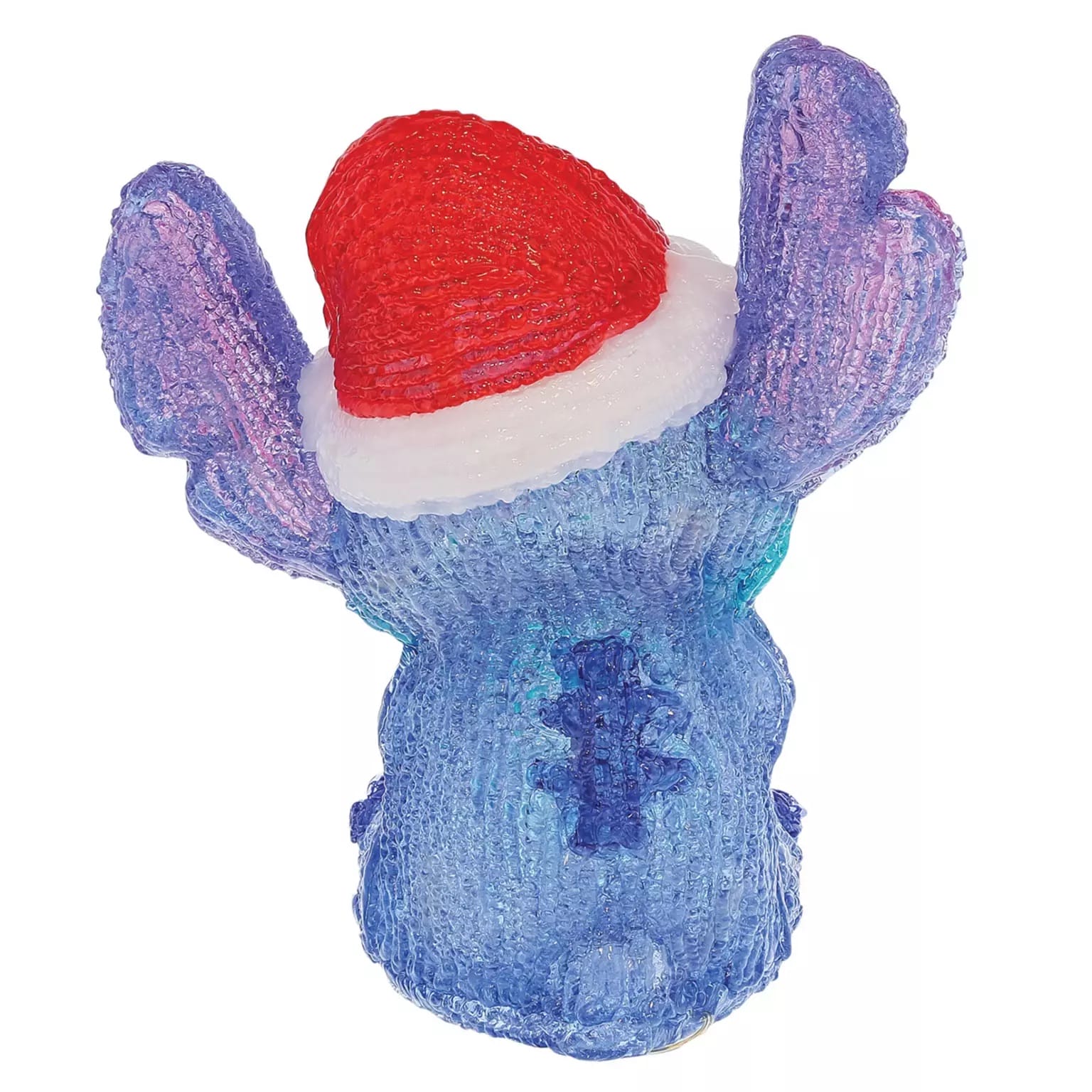 A blue Stitch figurine, seen from behind with a red Santa hat, part of Disney Parks 2025 holiday merch, no castle in view.