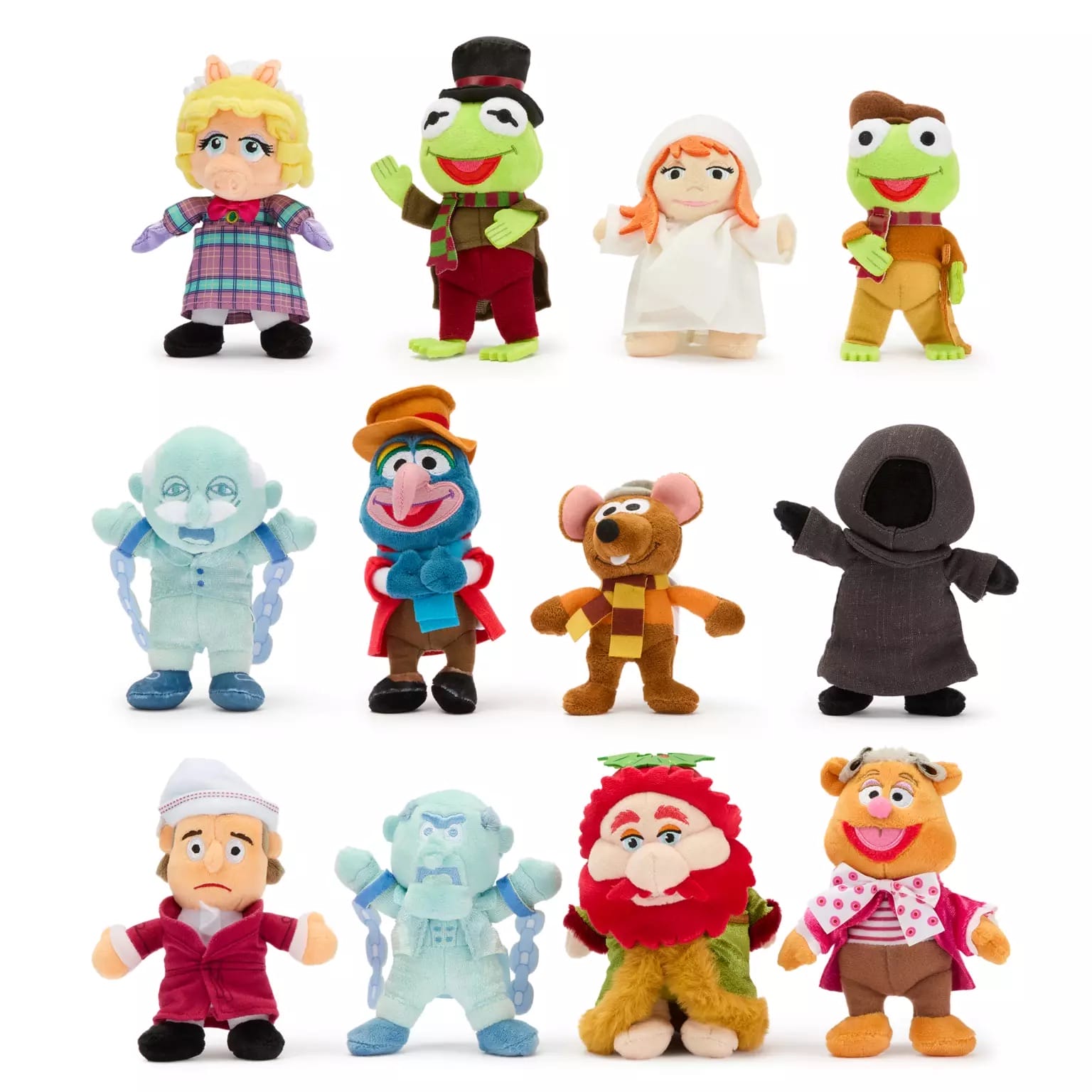 Twelve plush dolls from the Muppet Christmas Carol make a festive Countdown to Christmas, arranged in three cheery rows.