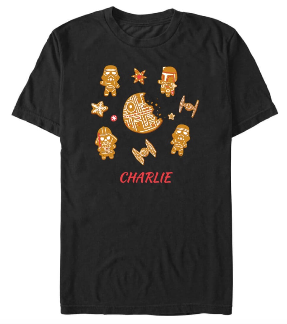 Disney Store black tee with Star Wars gingerbread ships, "Charlie," 2025 Christmas merch—no park castle shown for comparison.