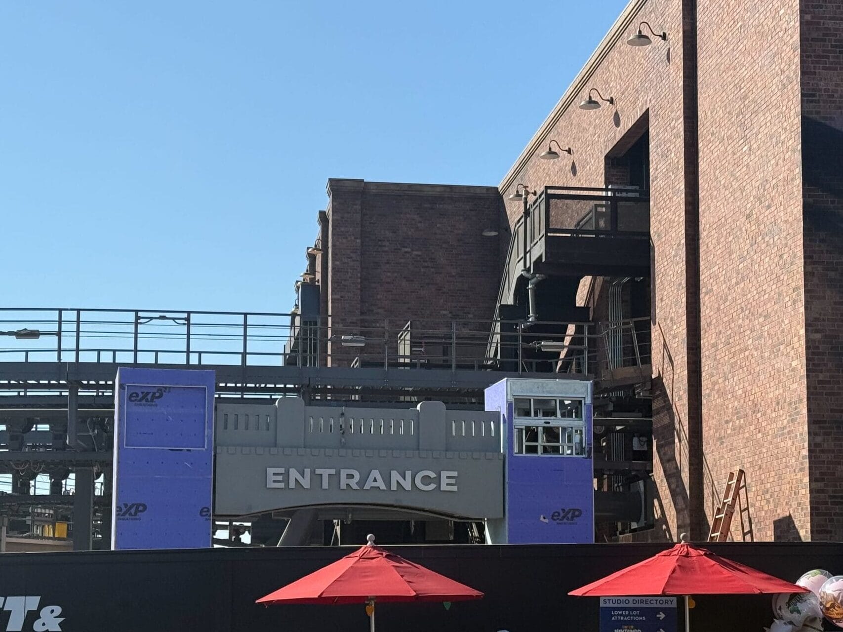 Entrance archway behind construction walls for Fast & Furious: Hollywood Drift at Universal Studios Hollywood.