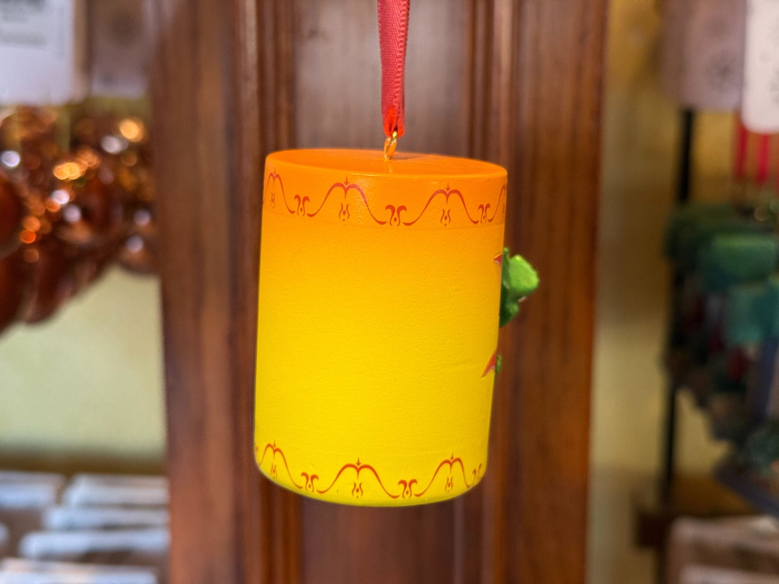 Back of Disney Sketchbook ornament of a yellow floating lantern from Tangled.