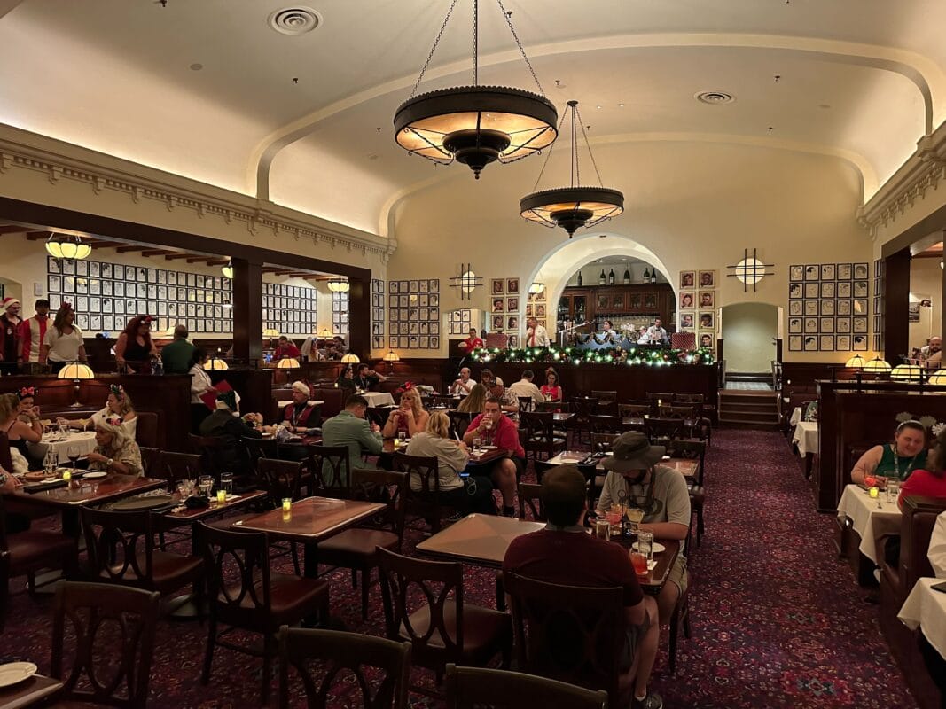 Guests enjoy Jazzy Holidays at The Hollywood Brown Derby restaurant in Disney's Hollywood Studios.
