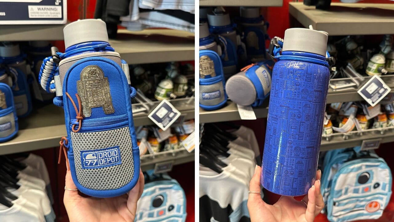 A blue Droid Depot water bottle with R2-D2 designs, shown in a mesh pouch at Disney's Hollywood Studios.