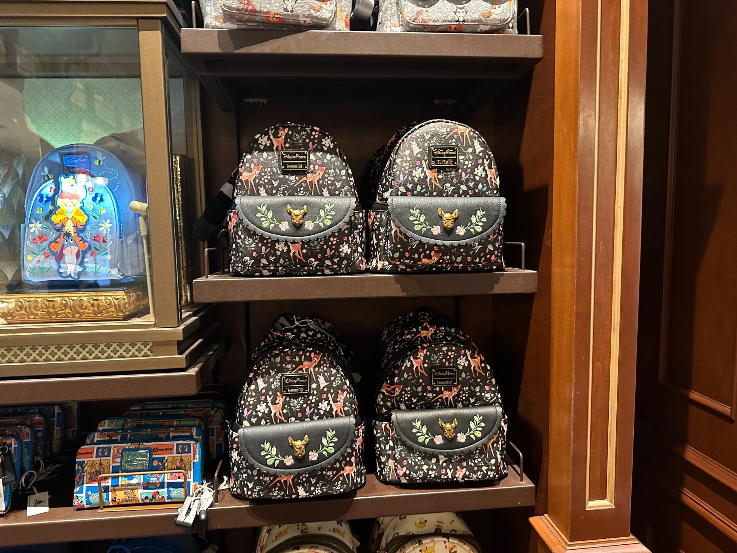 Bambi Loungefly Backpack Disney World with gold Mickey Mouse accents displayed