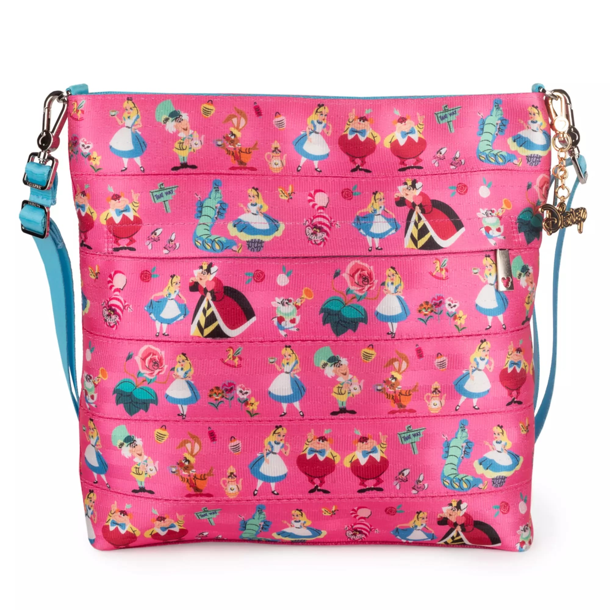 Bright pink Harveys shoulder bag with blue strap featuring colorful Alice in Wonderland character illustrations and patterns.