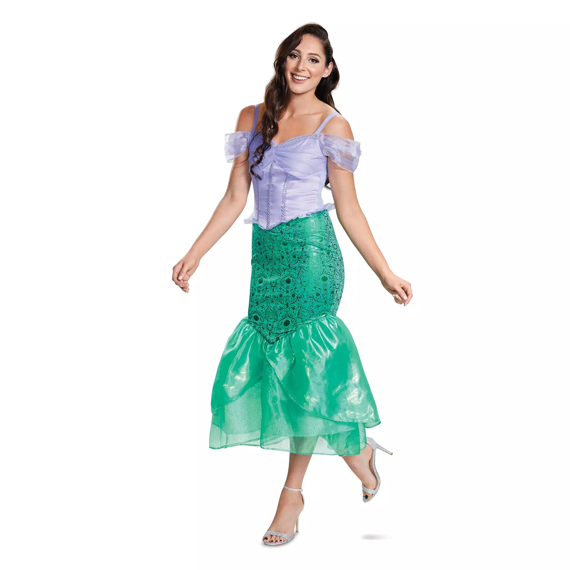 Woman in a mermaid costume from Disney Store, with a purple top and green tail skirt, smiling and posing for Halloween.