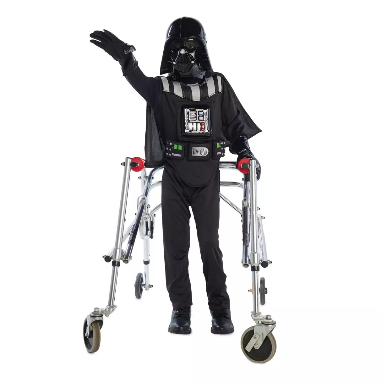 Person in a Darth Vader costume stands with one arm raised, using a walker—perfect for unique Halloween costumes.