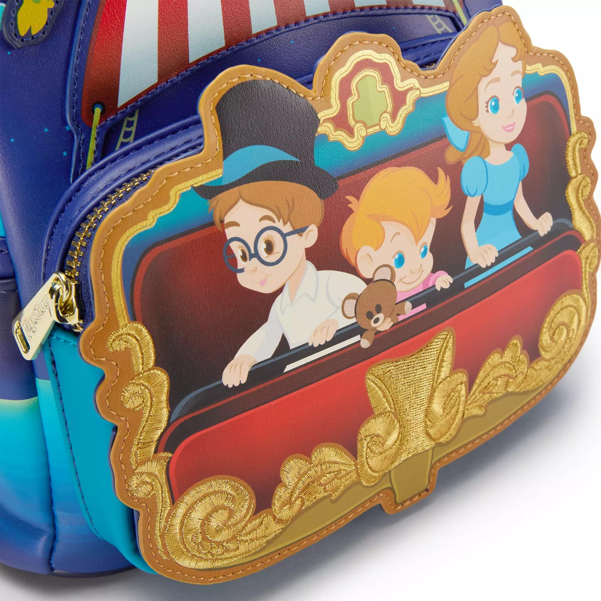 Close-up of a Loungefly Backpack showing animated children on a carnival ride, bordered with gold and bright colors.