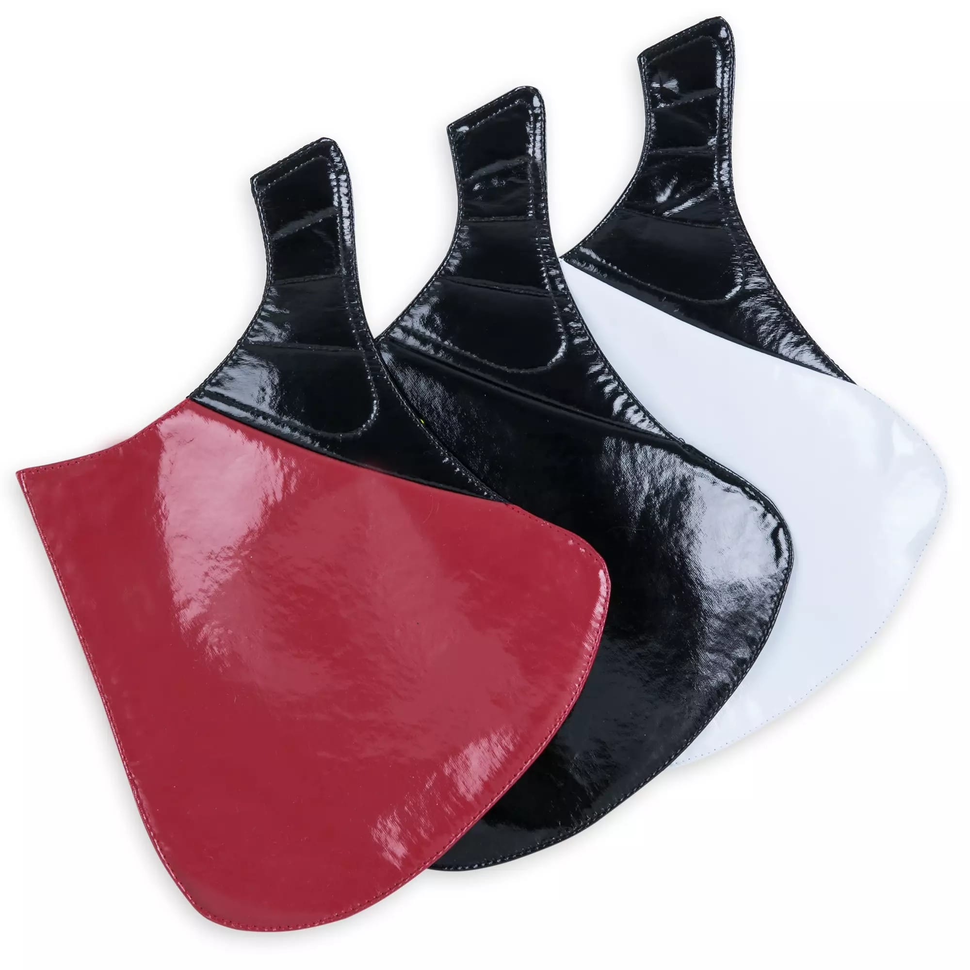 Three shiny vinyl barber capes in red, black, and white evoke bold Inside Out or Fantastic Four vibes on a white background.