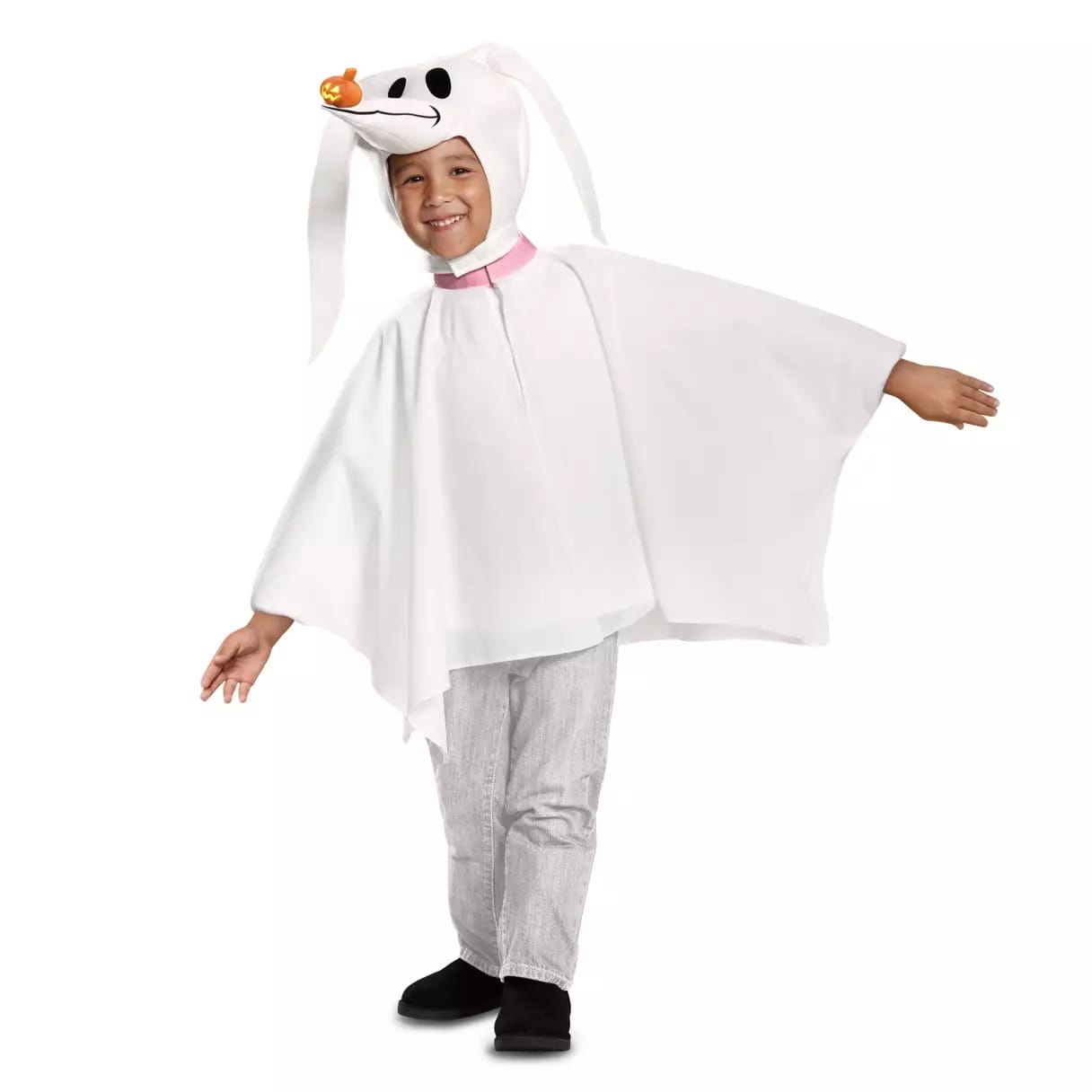 Child smiling in a white Zero costume from "The Nightmare Before Christmas"—a Disney Store Halloween costume with cute floppy ears.