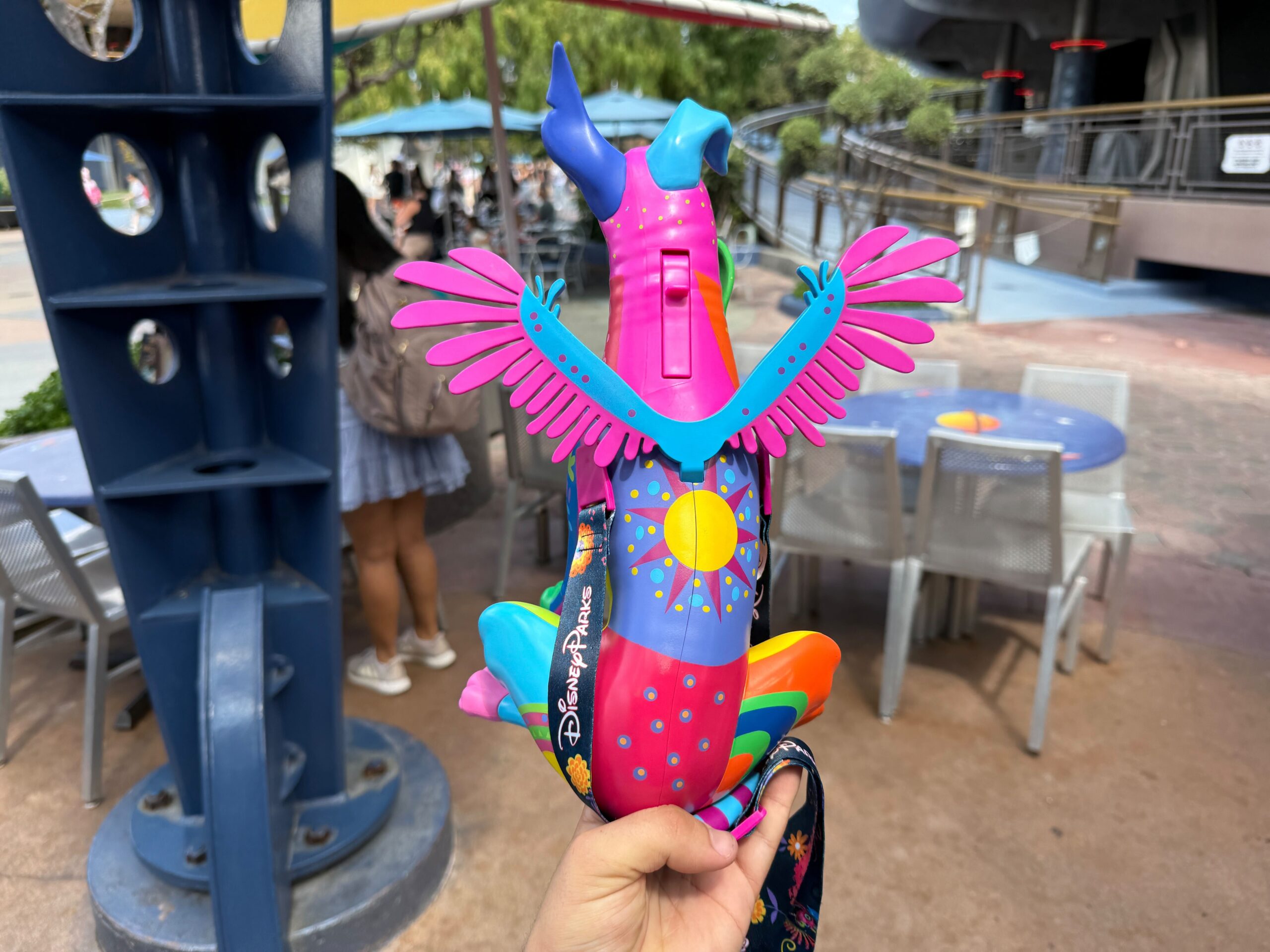 A colorful, winged Disney popcorn bucket shaped like a dragon at Plaza de la Familia in Disneyland Resort.