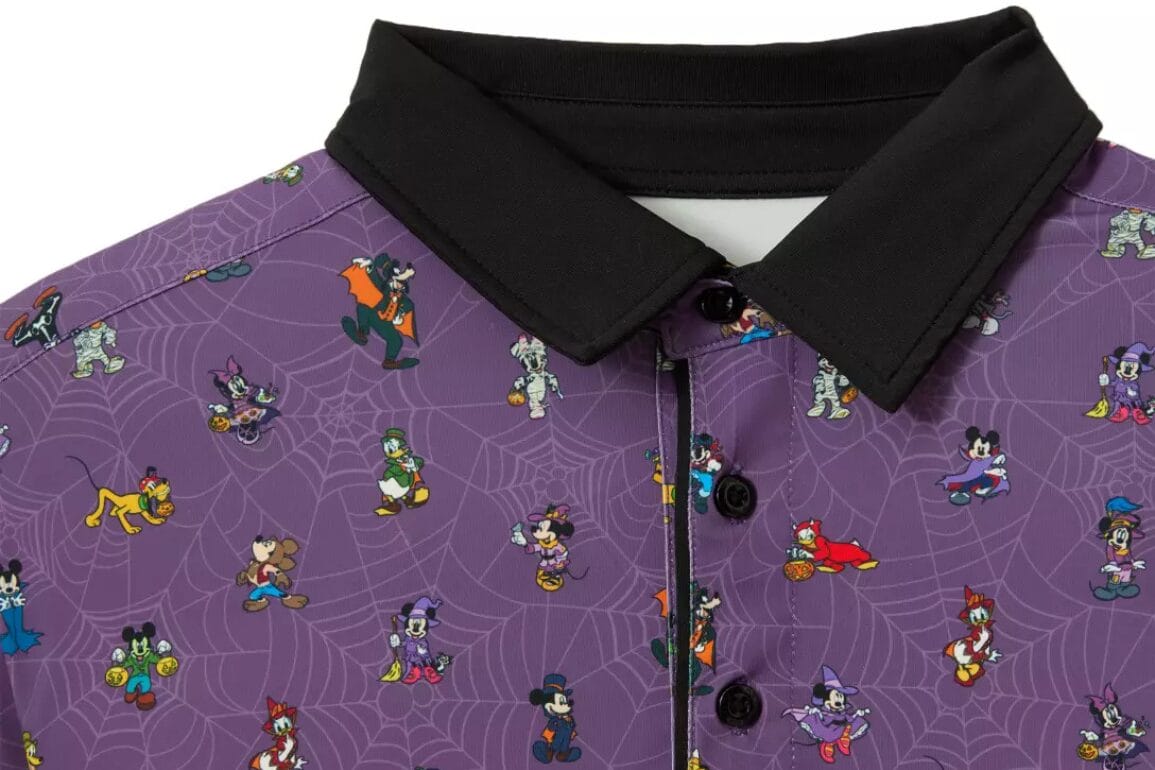 Exclusive Disney Store purple collared shirt with cartoon characters in Halloween costumes and white spiderwebs all over.