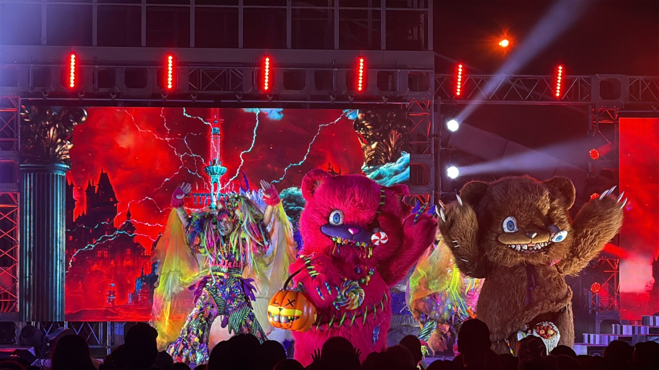 Performers in monstrous costumes dazzle on stage at Sweet Scream Party during Halloween Horror Nights 2025.