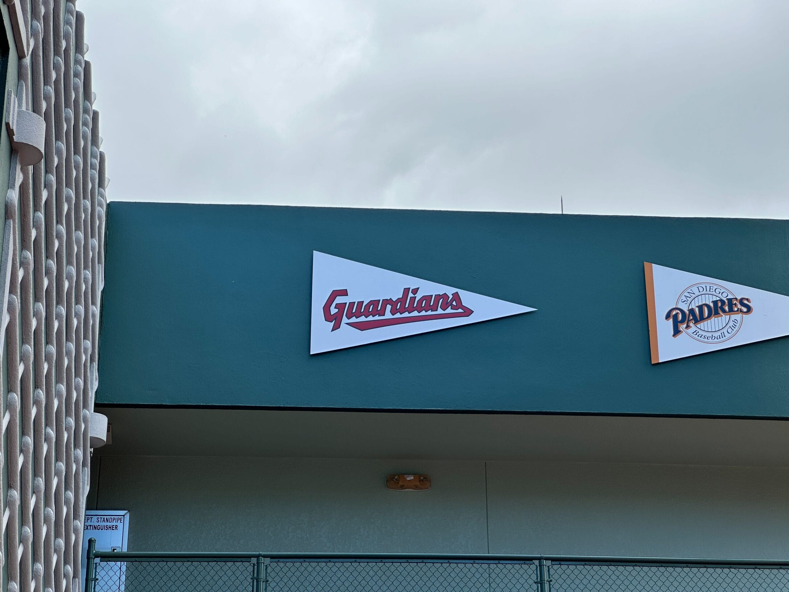 A white "Guardians" pennant replaced a Cleveland Indians flag on a teal wall at Disney's All-Star Sports Resort.