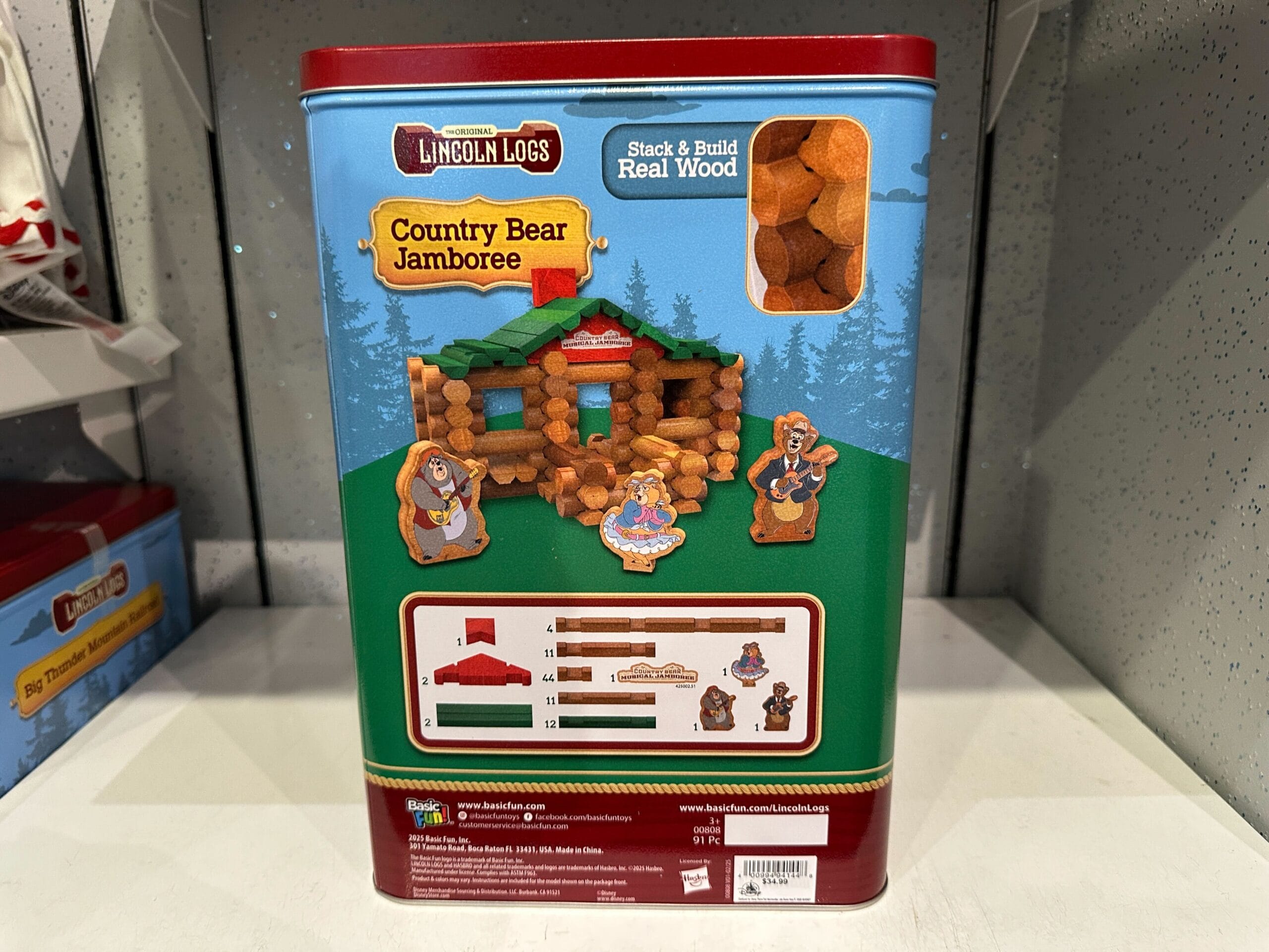 Lincoln Logs Country Bear Jamboree set tin with log cabin illustration and bear character cutouts on the front.