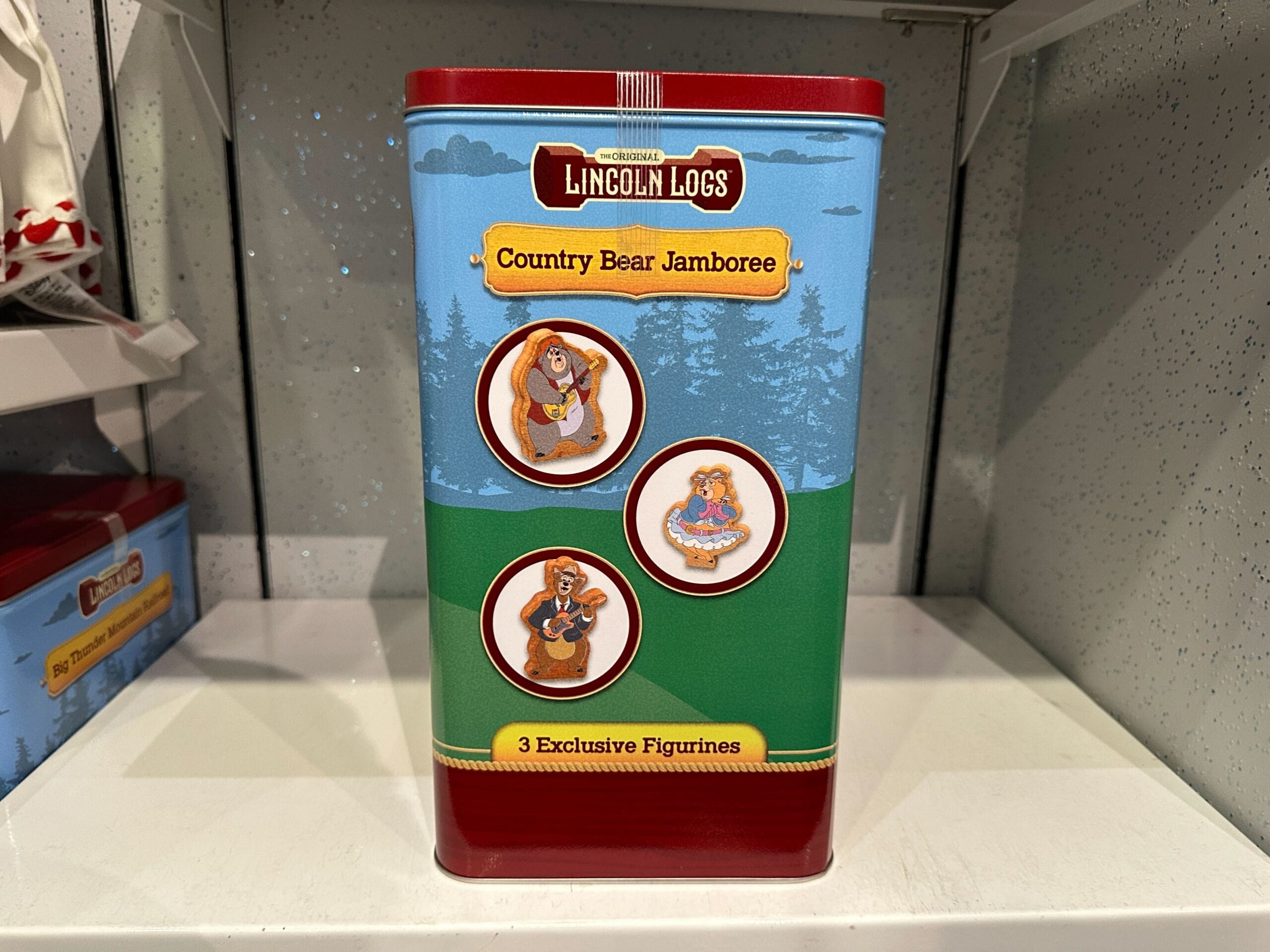 Lincoln Logs tin featuring "Country Bear Jamboree" with images of three exclusive bear figurines on the front.