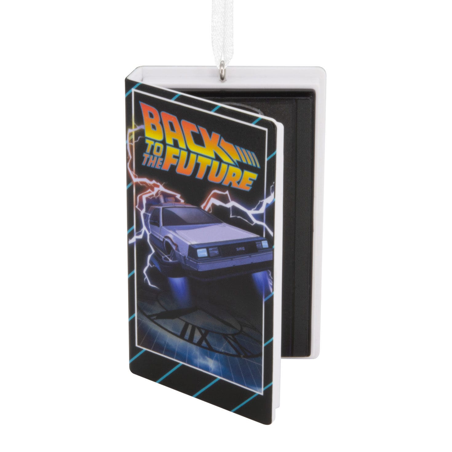 Rectangular Hallmark ornament with "Back to the Future" DeLorean art, hanging by a white ribbon