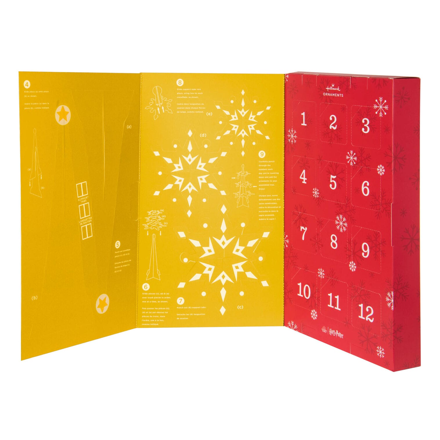 Red and yellow advent calendar with numbered doors, open to reveal Hallmark Ornaments instructions