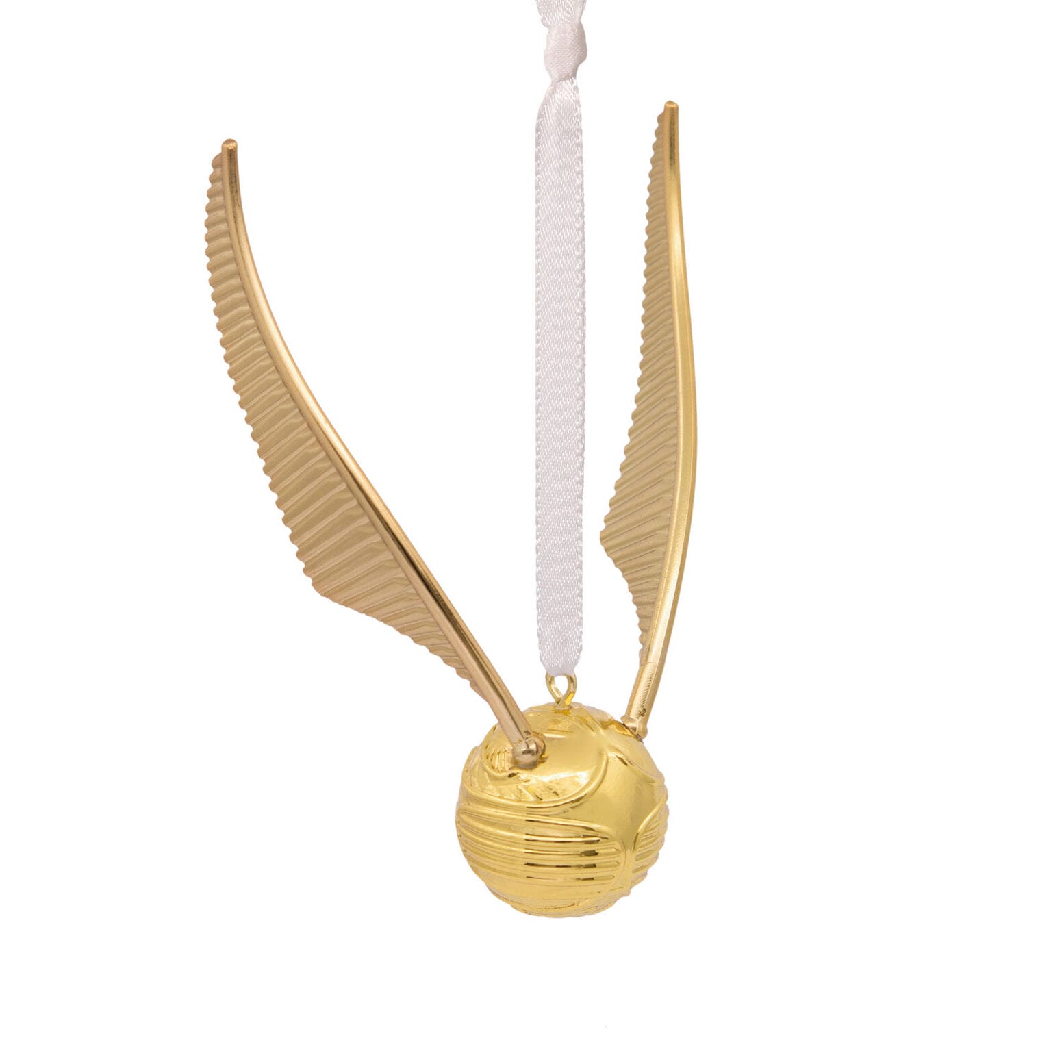 Gold winged ball ornament with white ribbon, reminiscent of magical moments, hangs against a white background