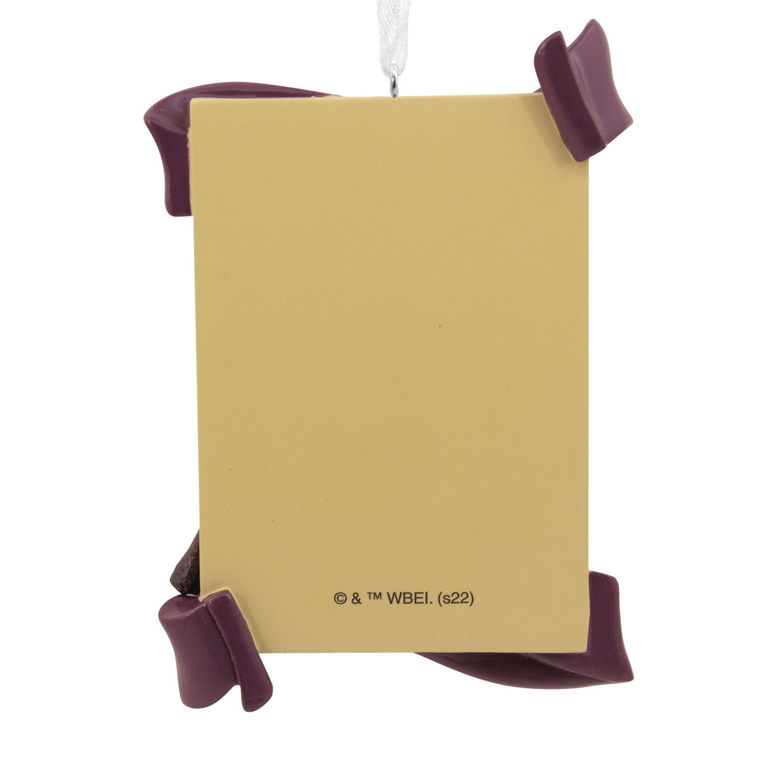 A yellow rectangular Hallmark Ornament with purple accents and white ribbon
