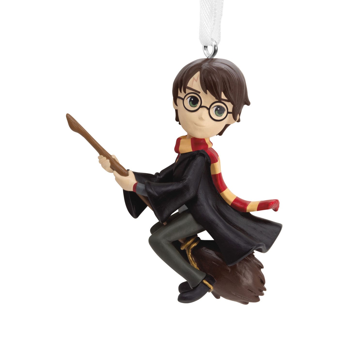 Cartoon with glasses and scarf flying on broomstick.