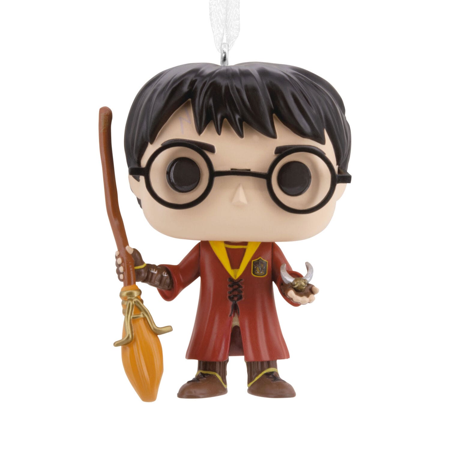 A Hallmark Ornaments Funko Pop! of a boy wizard in glasses and red robe, holding broomstick and golden snitch
