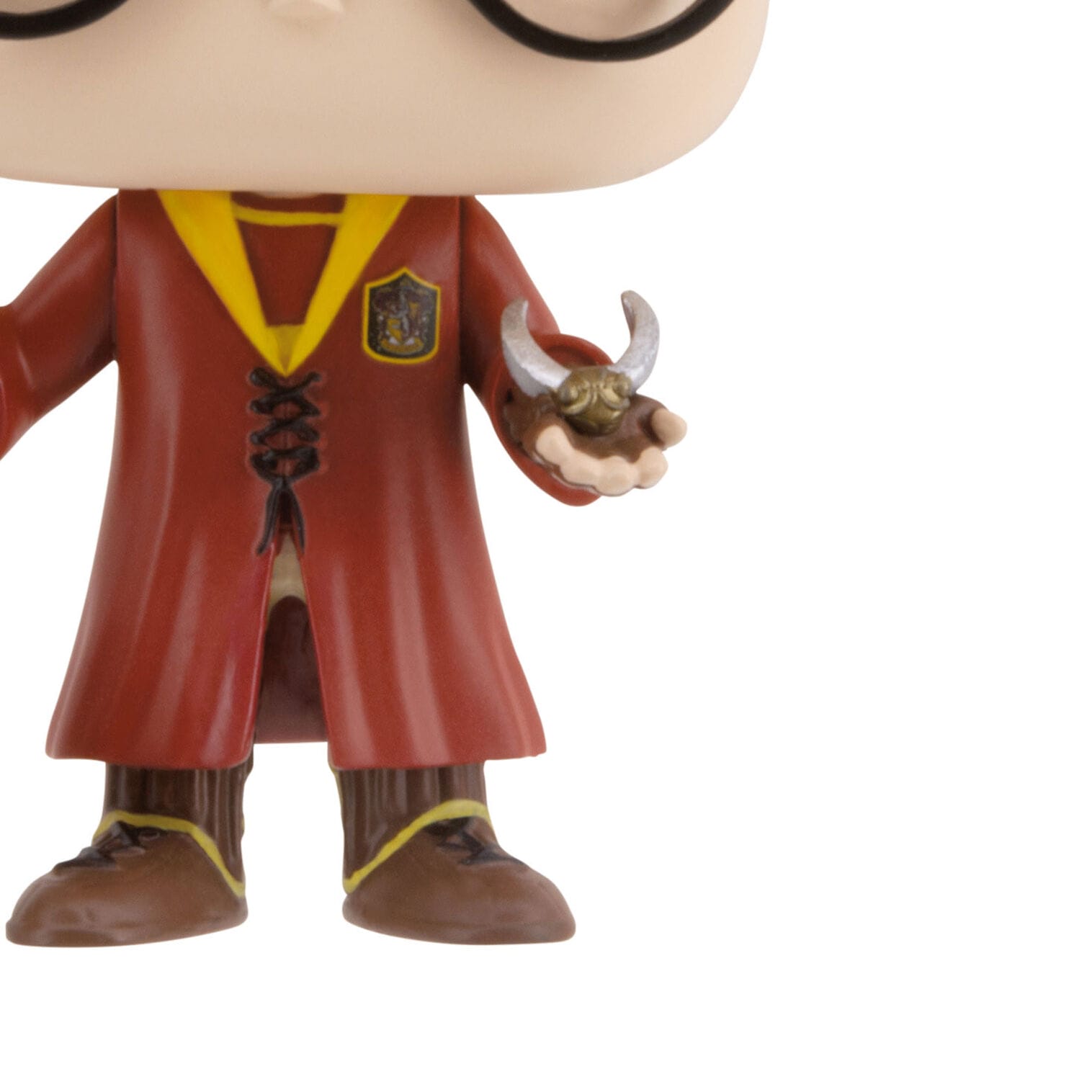Vinyl figure in glasses and red robe holds a golden snitch
