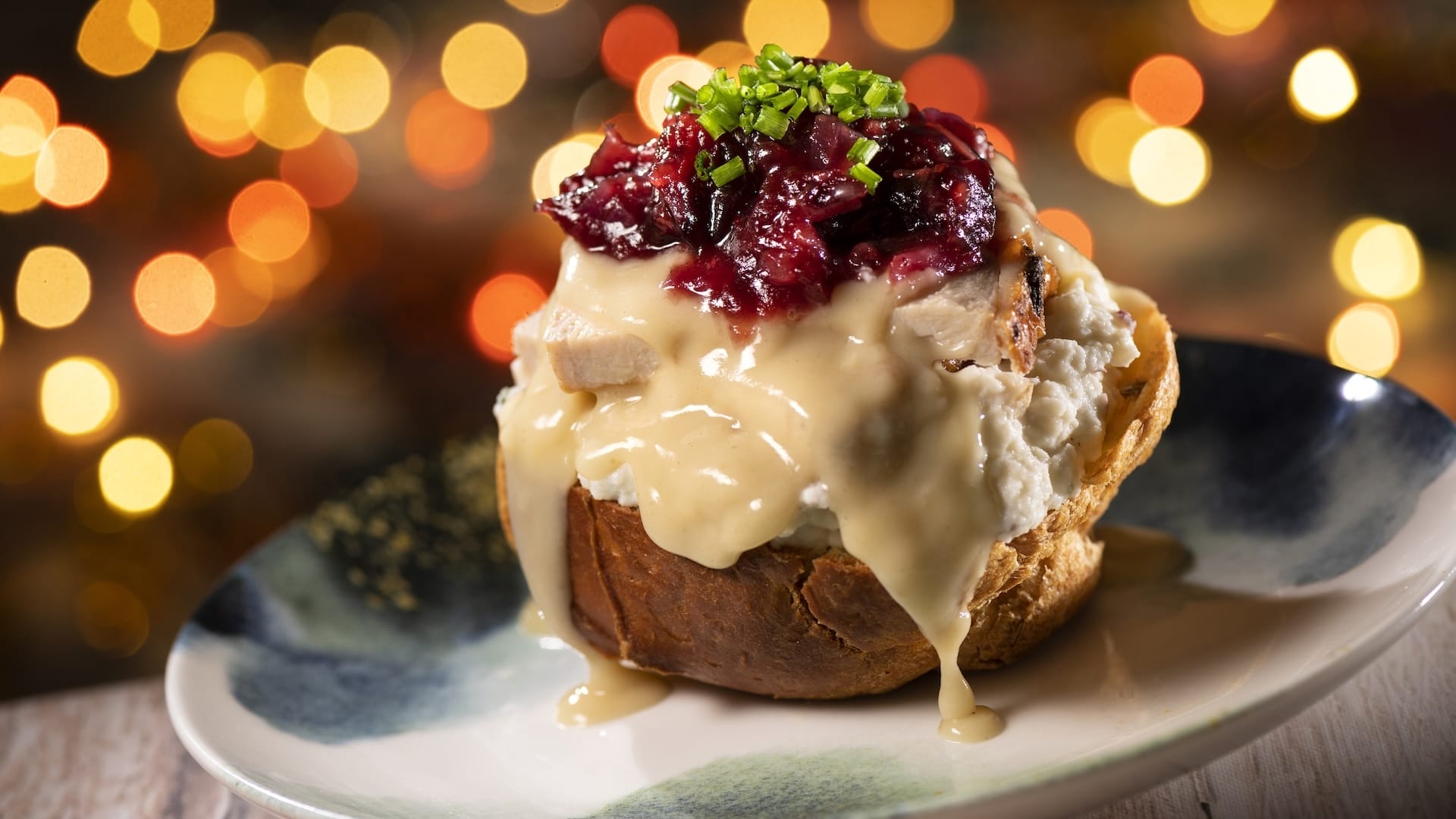 A hearty bread bowl with turkey, gravy, and fixings—a festive Jollywood Nights 2025 treat at Walt Disney World.