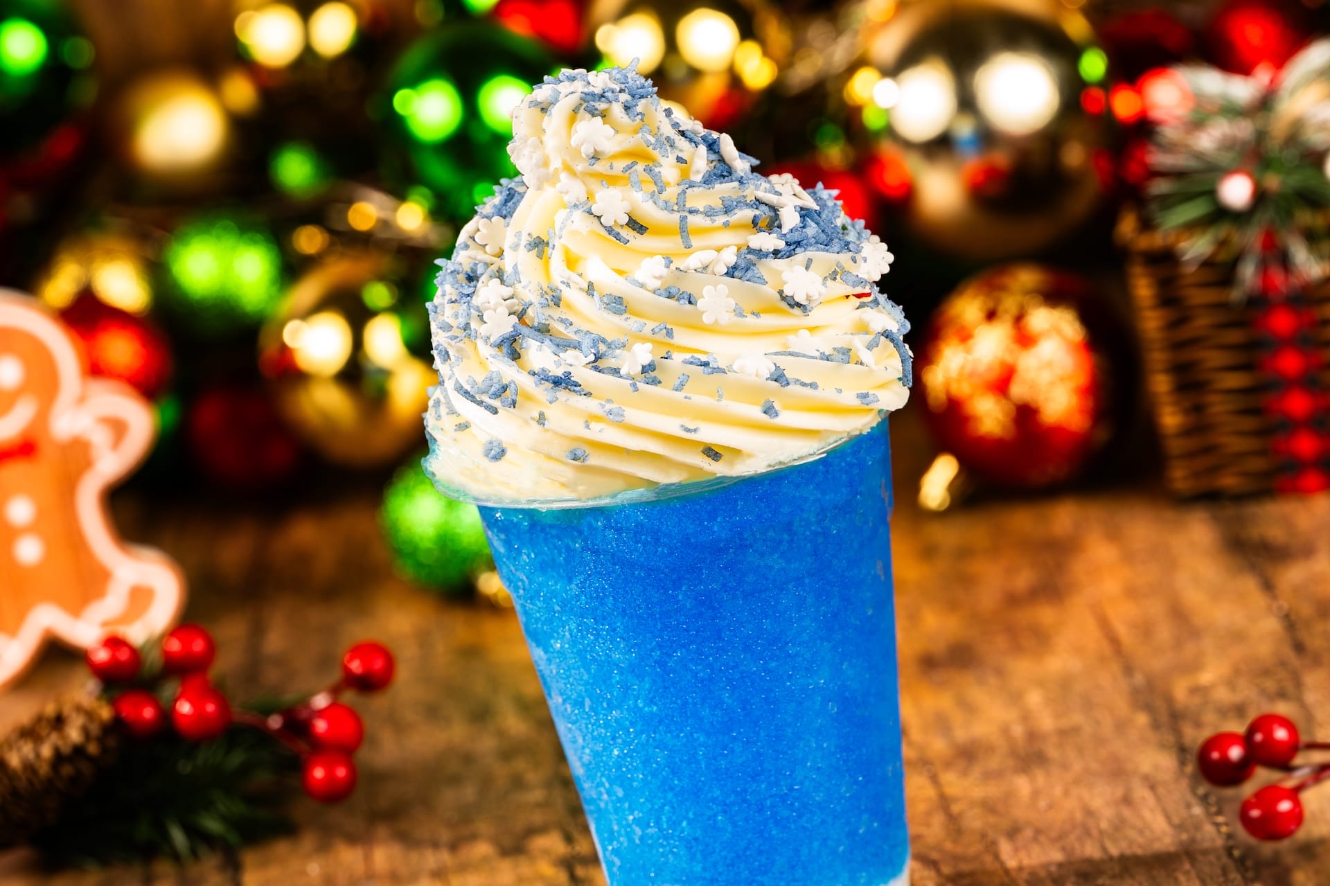 Festive blue milkshake with whipped cream and sprinkles, from Mickey’s Very Merry Christmas Party at Walt Disney World.