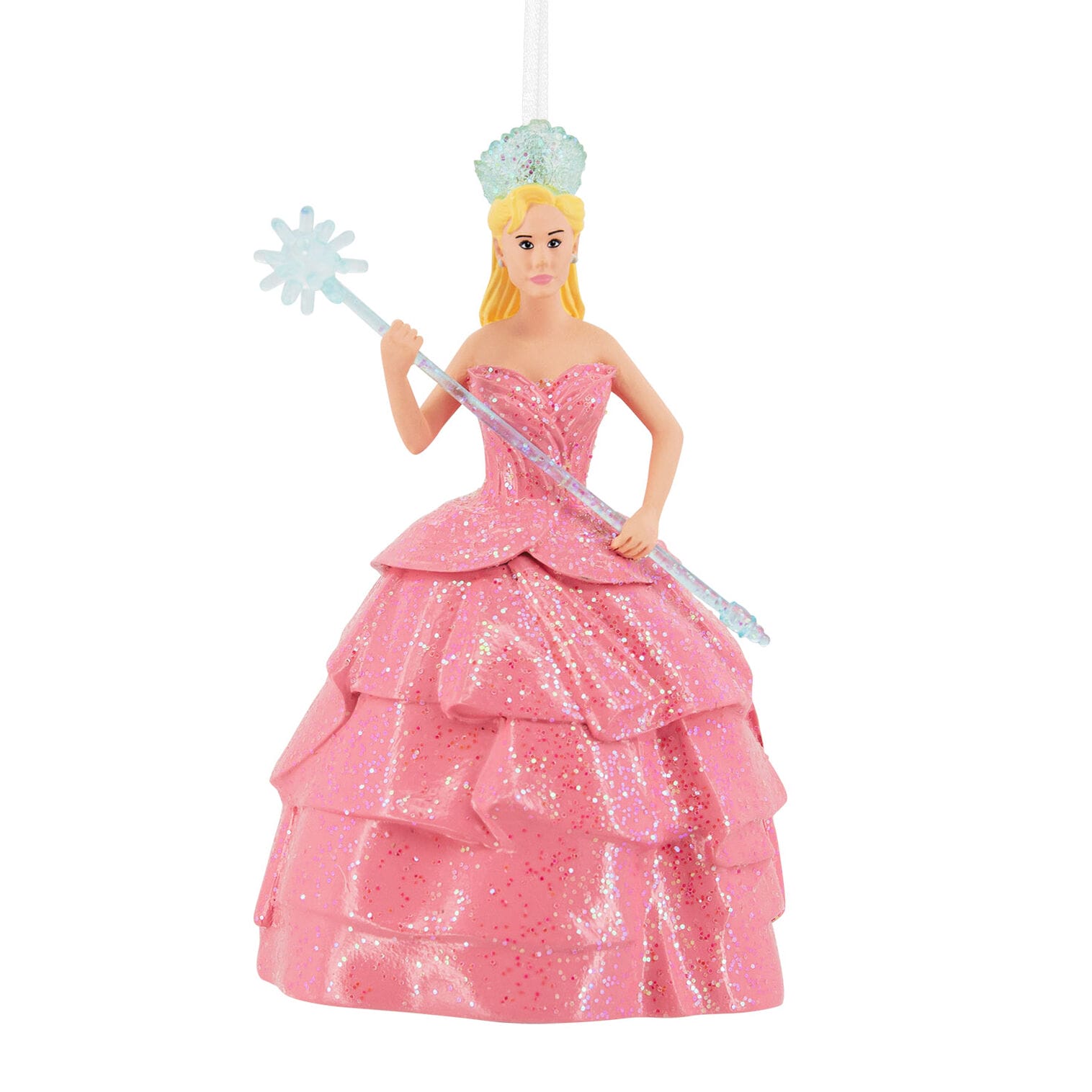 Hallmark ornament of a woman in a glittery pink dress, holding a star wand and wearing a crown