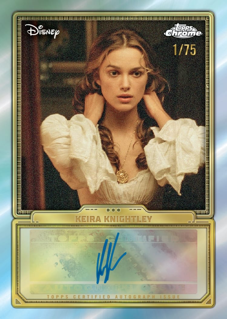 A Topps Trading Card collectible shows Keira Knightley in period attire, hands at neck, signed in blue—no Disney castle present.