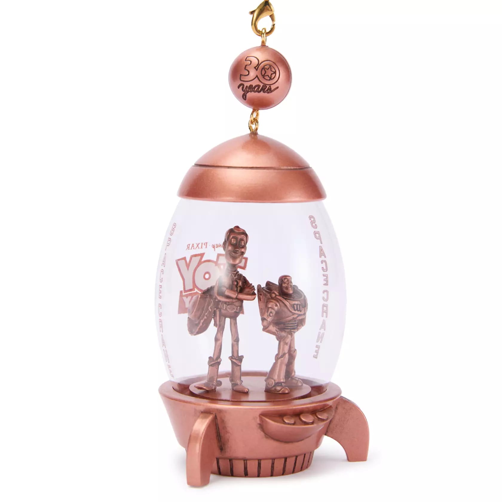 Bronze Toy Story 30th Anniversary ornament featuring Buzz and Woody inside a rocket-shaped capsule.