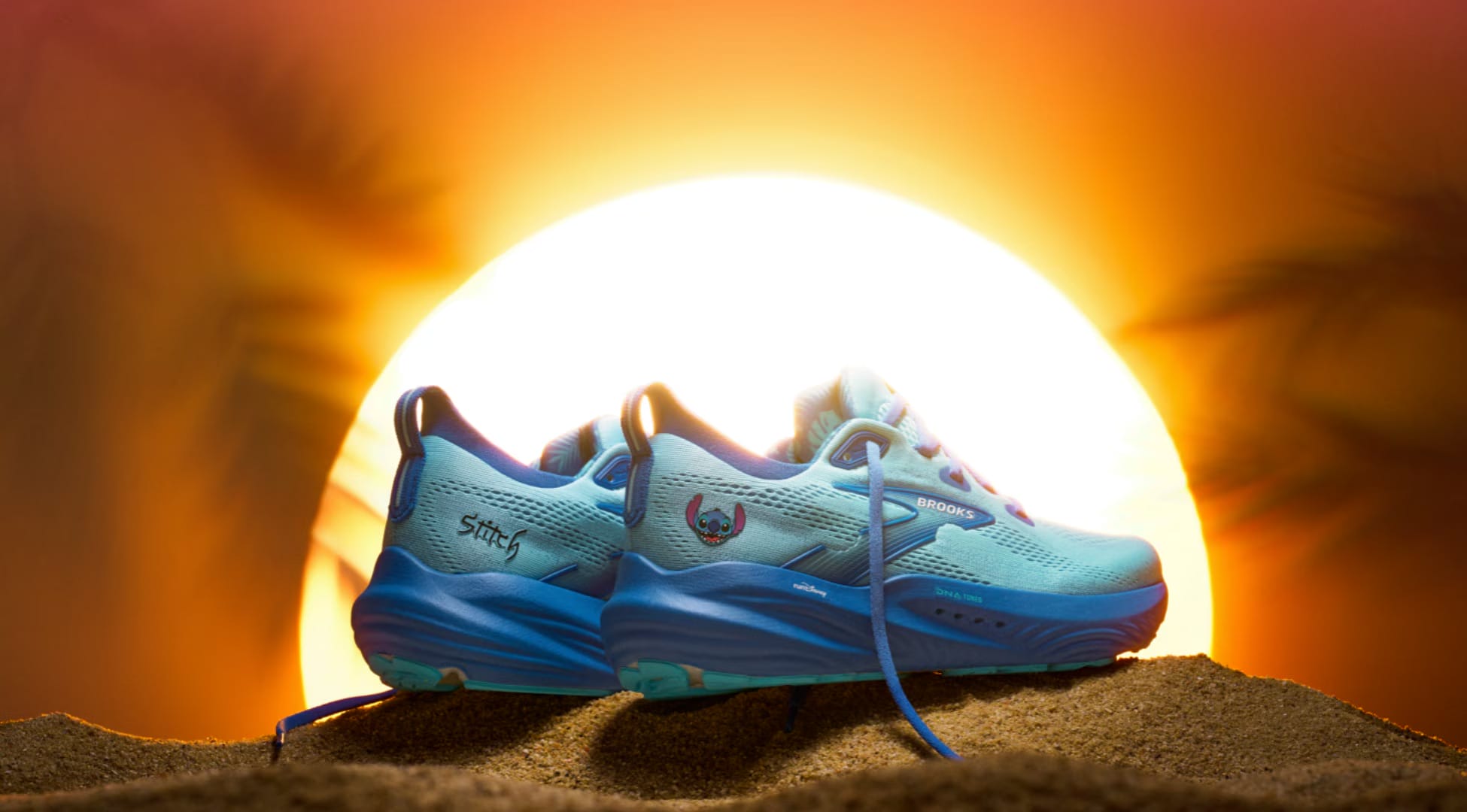 A pair of blue running shoes on sandy ground at sunset, reminiscent of walking Main Street after a day at Walt Disney World.