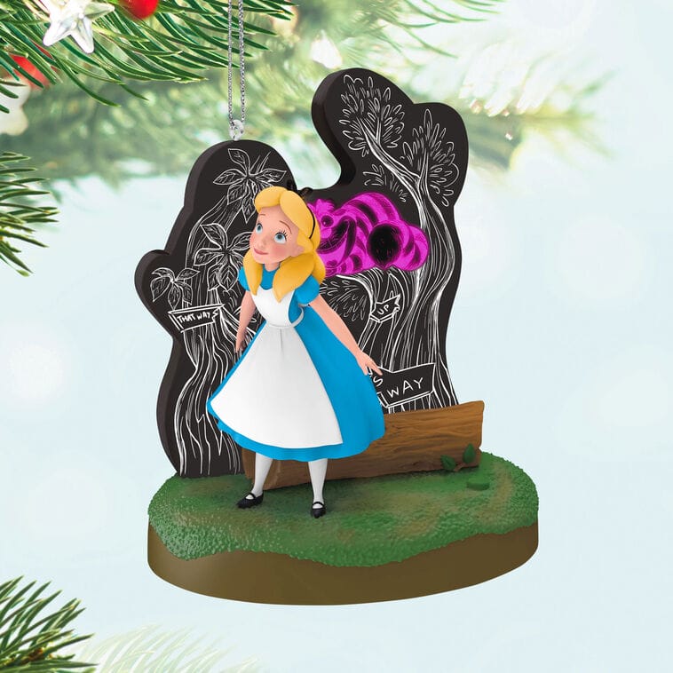 Hallmark Disney Keepsake Ornament of Alice in Wonderland and the Cheshire Cat in a black-and-white forest, evoking park magic.