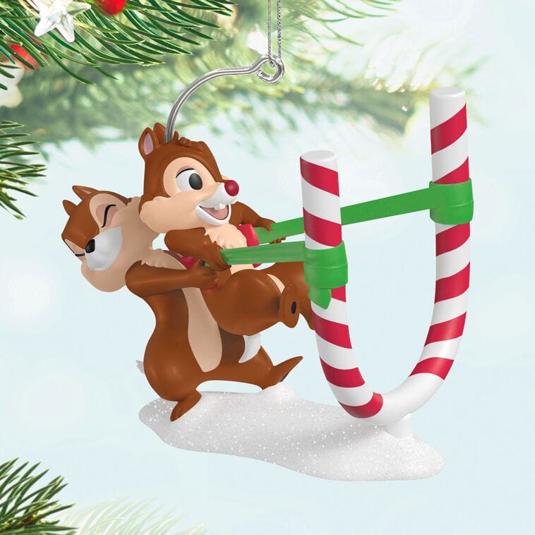 Chip and Dale Hallmark ornament—Dale in a candy cane slingshot as Chip pulls it back, ready for fun on your Disney tree. No castle.