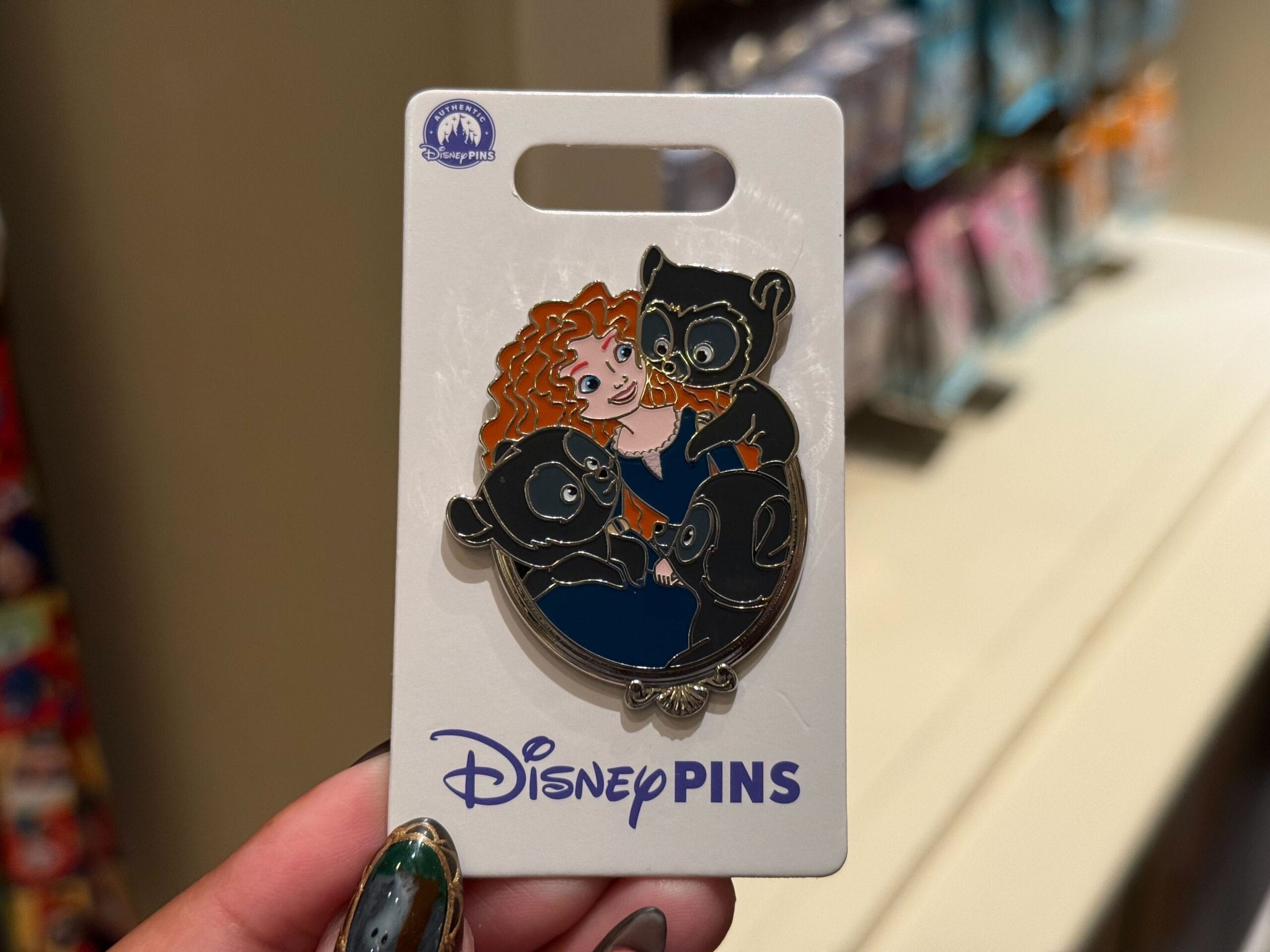 Disney Parks Princess Pin with Merida and the three bear cubs from "Brave" on a card; no castle featured in this pin.