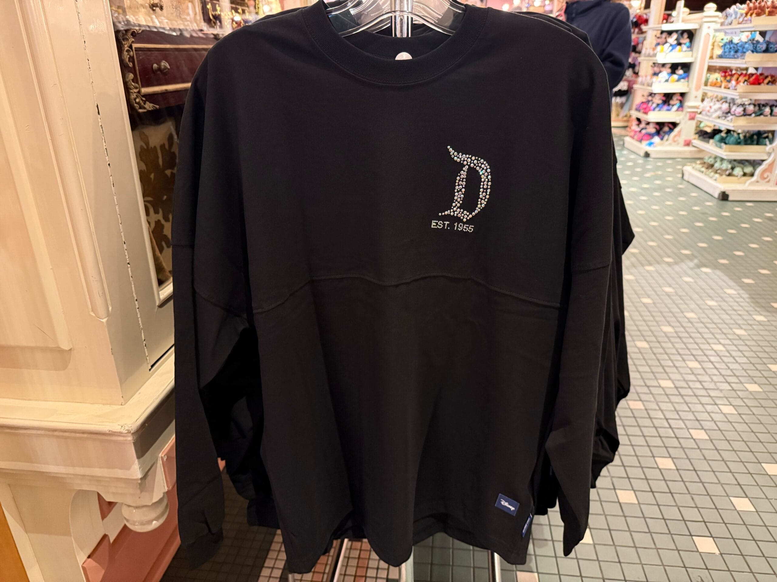 Black bedazzled Disneyland Spirit Jersey with jeweled "D" and "EST. 1955"