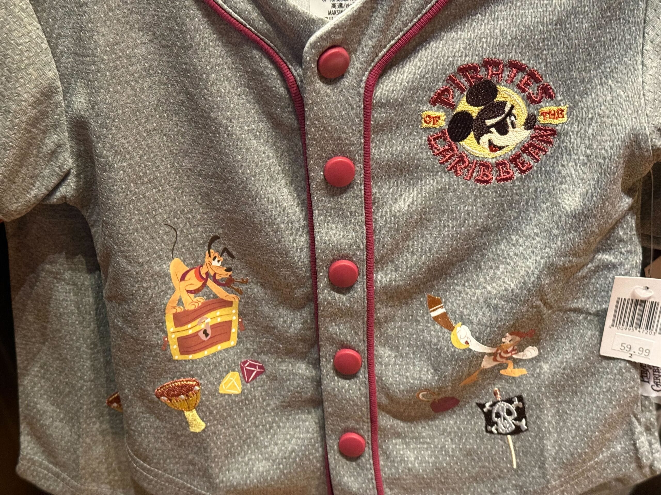 Gray jacket with maroon trim, Disney Parks Pirates of the Caribbean Mickey Mouse and pirate motifs, perfect for fans worldwide.