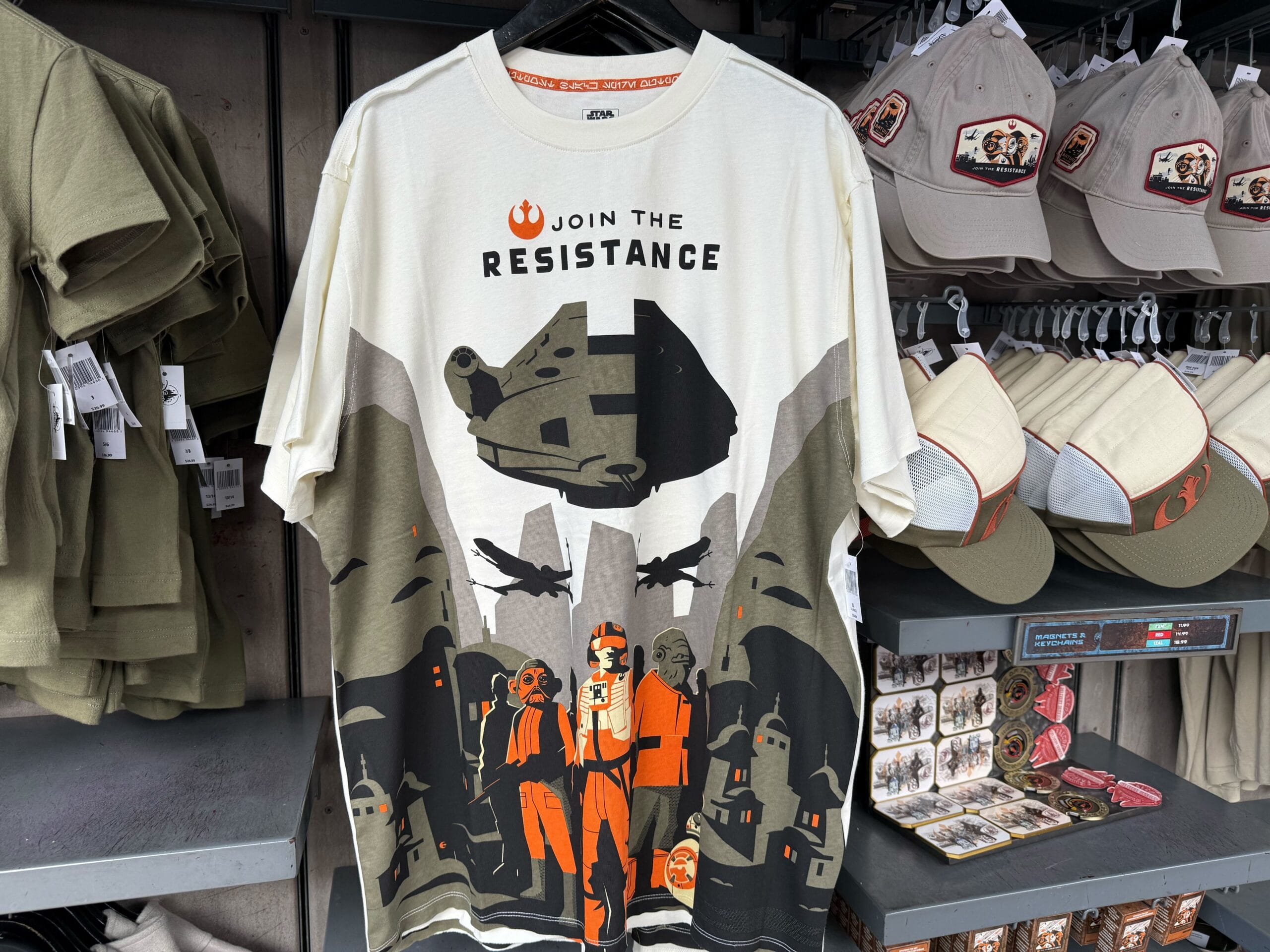 Star Wars "Join the Resistance" T-shirt with spaceships and characters, spotted at Disneyland's Galaxy's Edge in California.