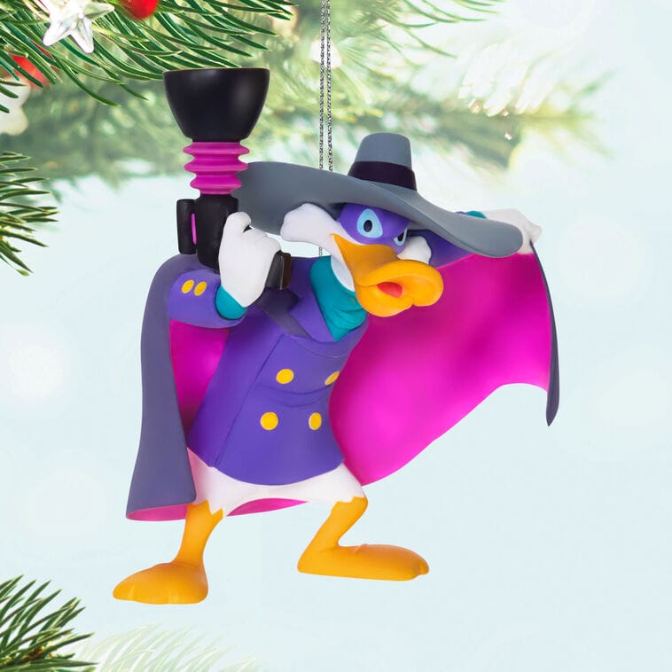 A cartoon duck superhero ornament from Hallmark’s Disney Keepsake Ornaments new releases, holding a gadget, not in park setting.